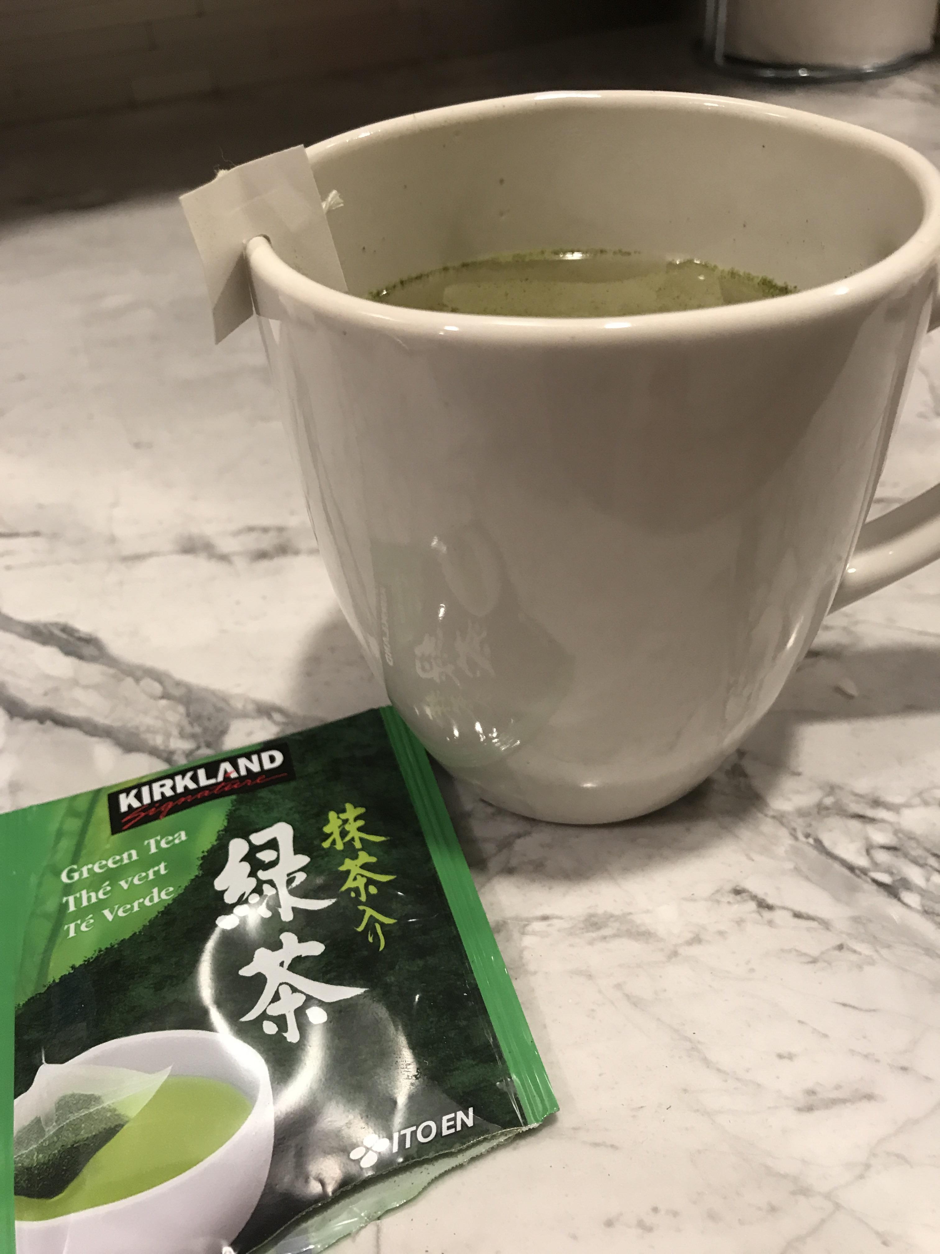 Kirkland brand green tea bags made to hang onto the edge of your mug