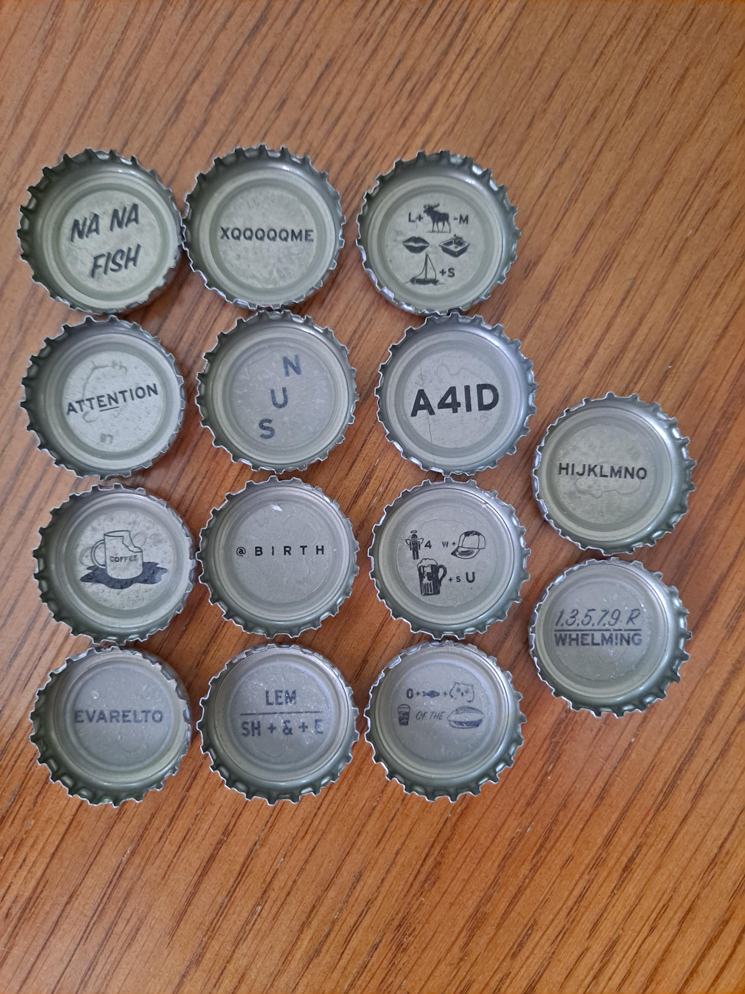 A weekend's worth of beer caps. Enjoy! r/rebus