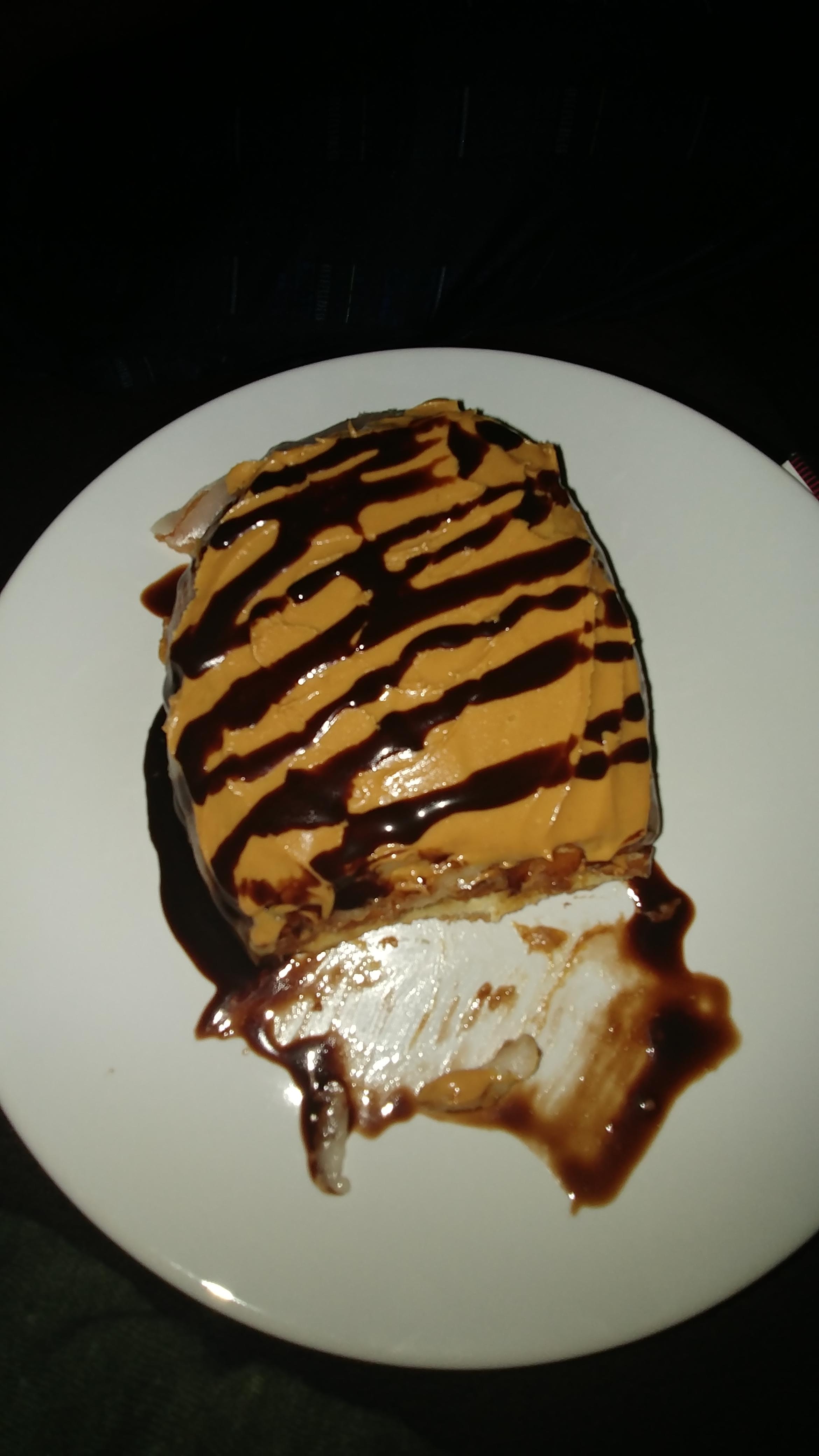 Gourmet honey bun lathered with peanut butter finished with a chocolate