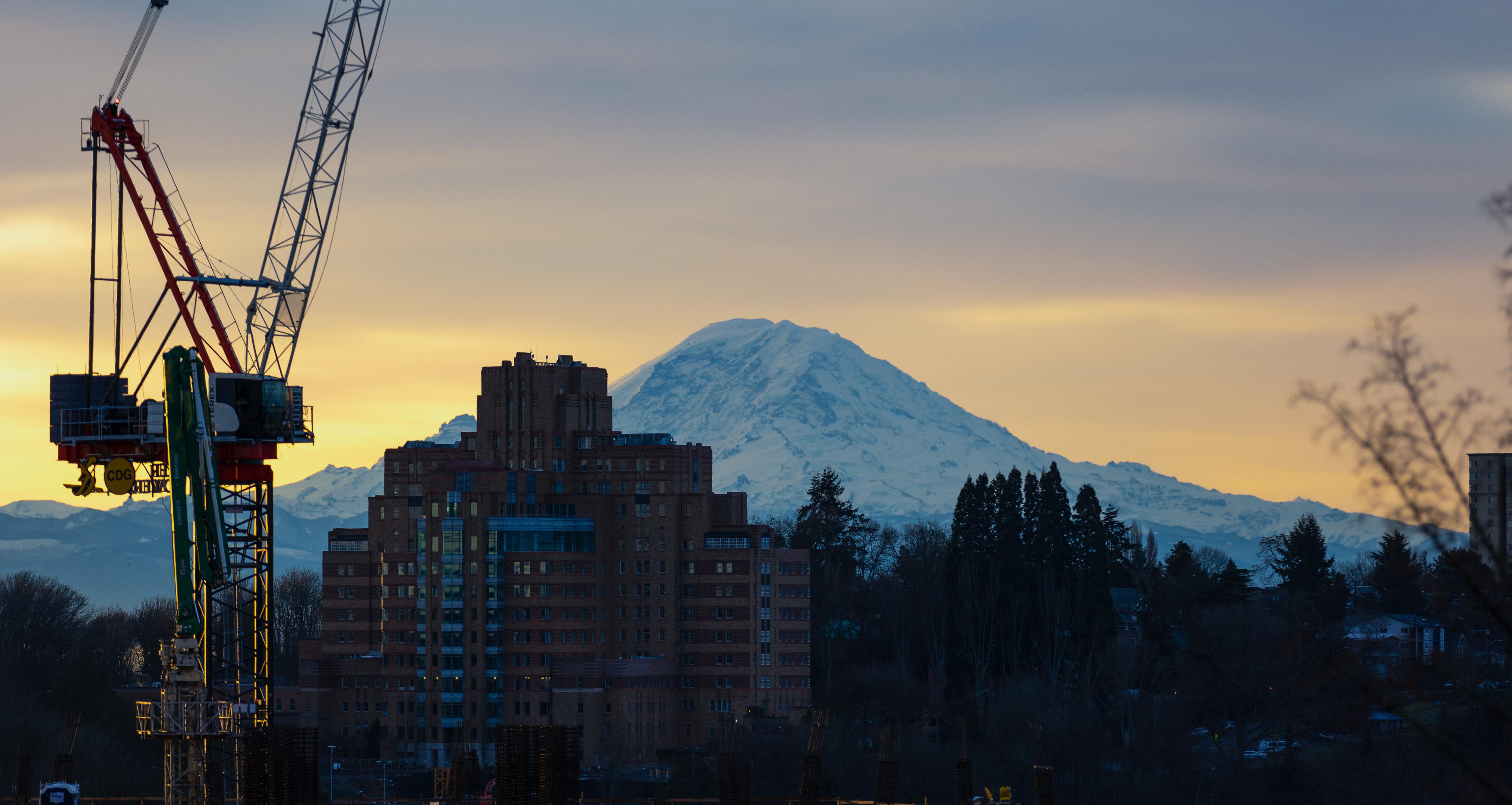 Old US Marine Hospital and Mount Rainier/Tahoma as viewed from First