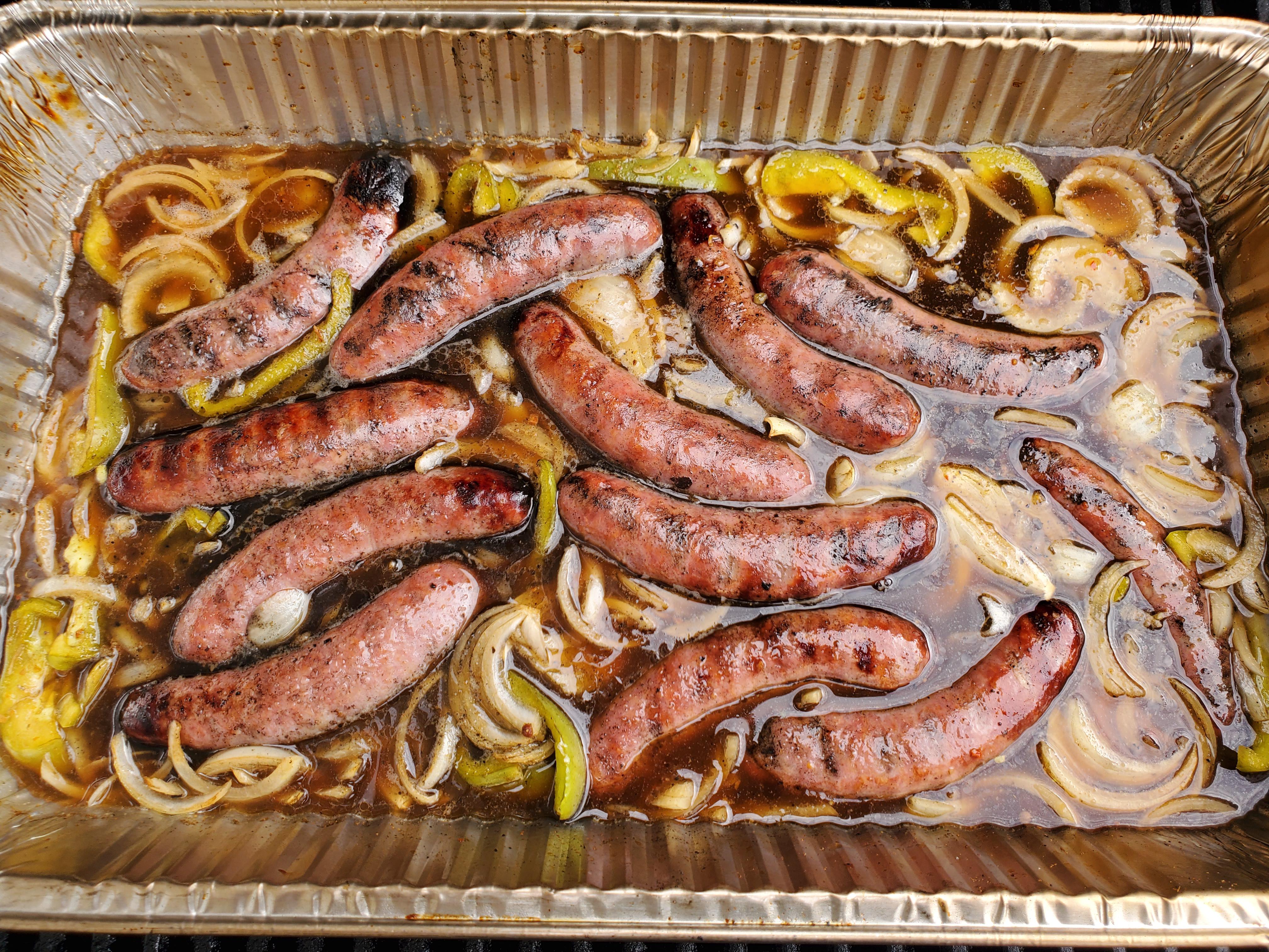 Smoked beer brats with peppers and onions. Used two different kinds of