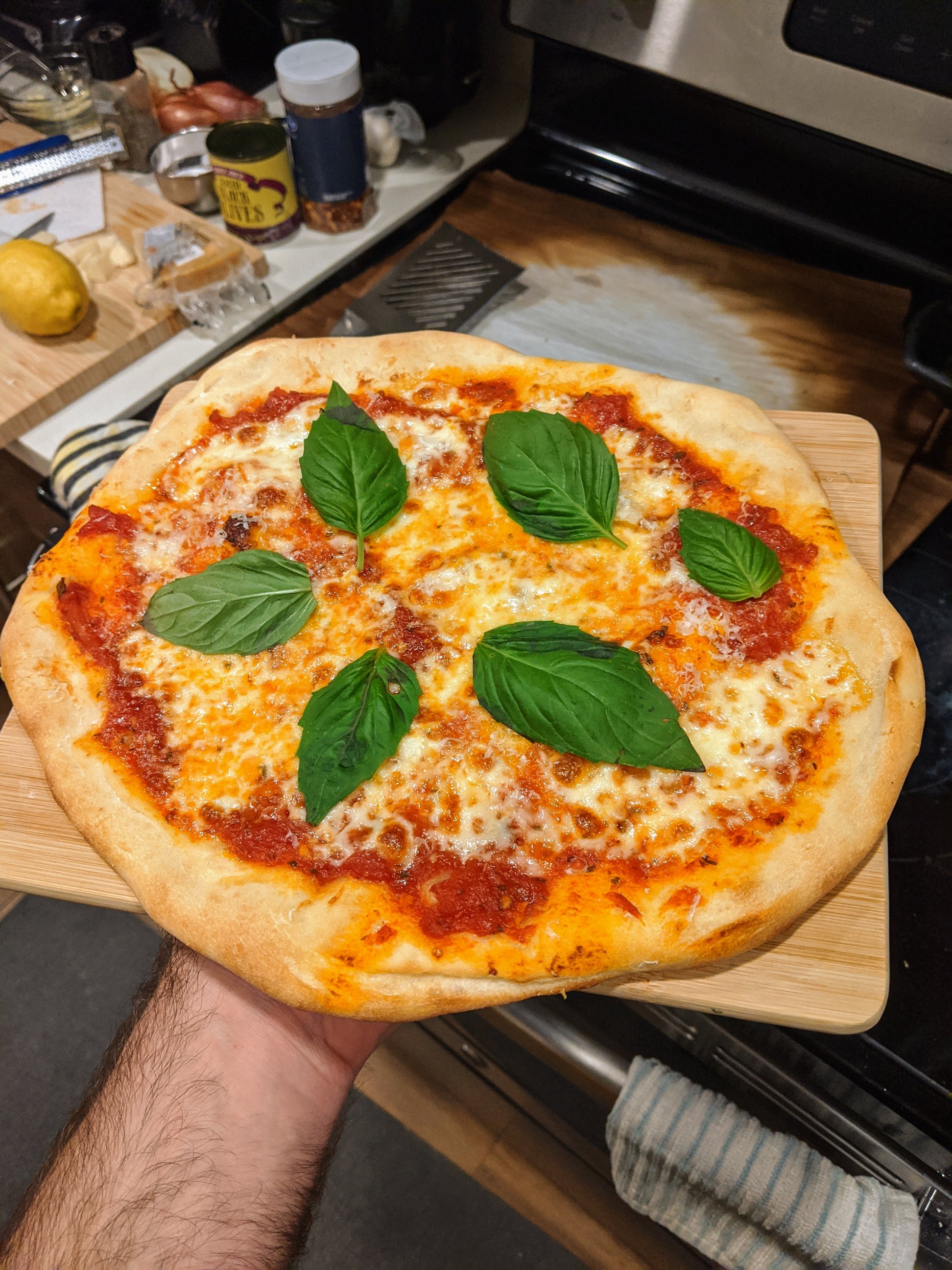 First time using a pizza stone this evening. Still using Trader Joe's dough, but I'm happy with