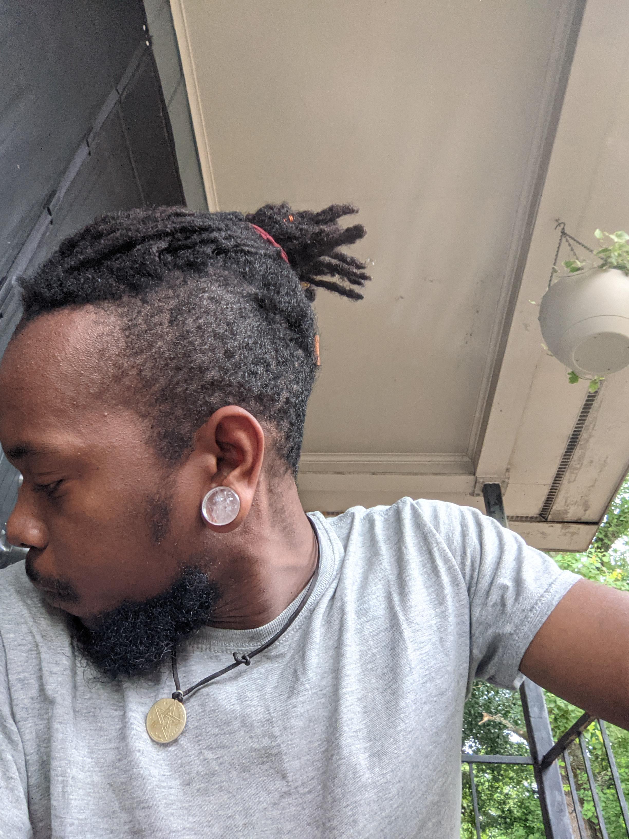 My lovely clear quartz plugs on my 3/4 stretched lobes r/Stretched