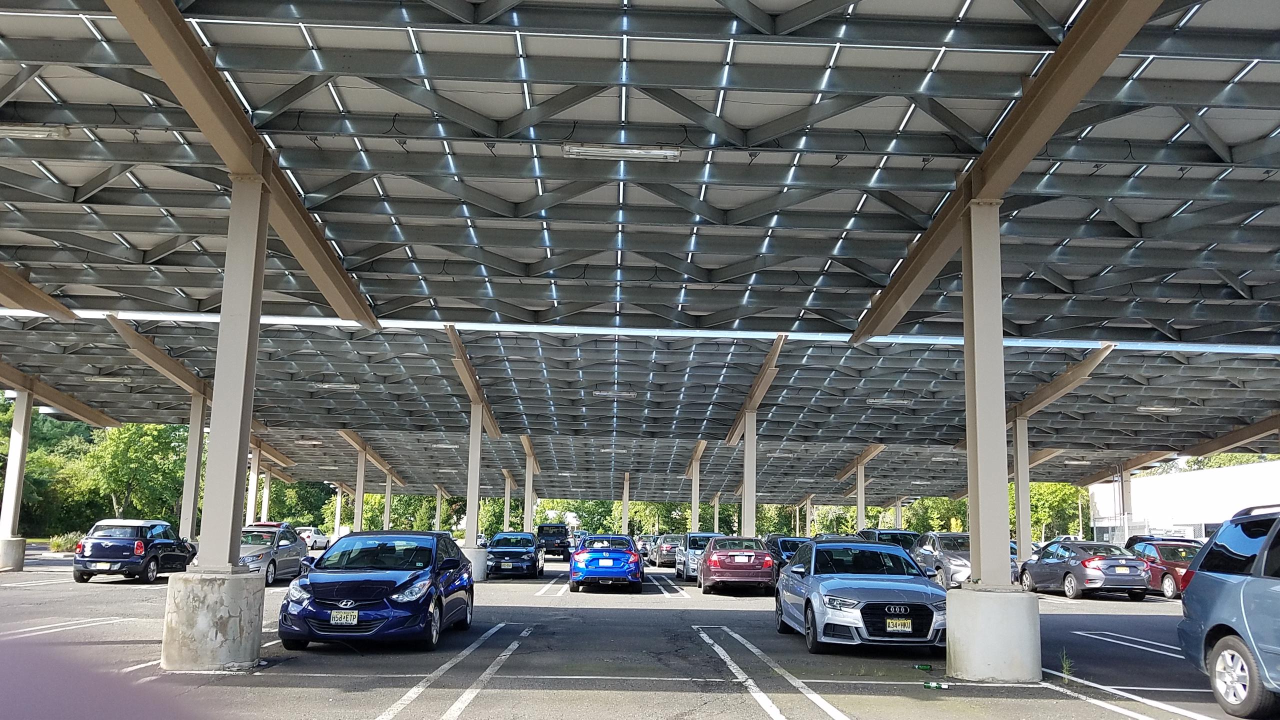 A car park covered by solar collectors in Piscataway, NJ. In England