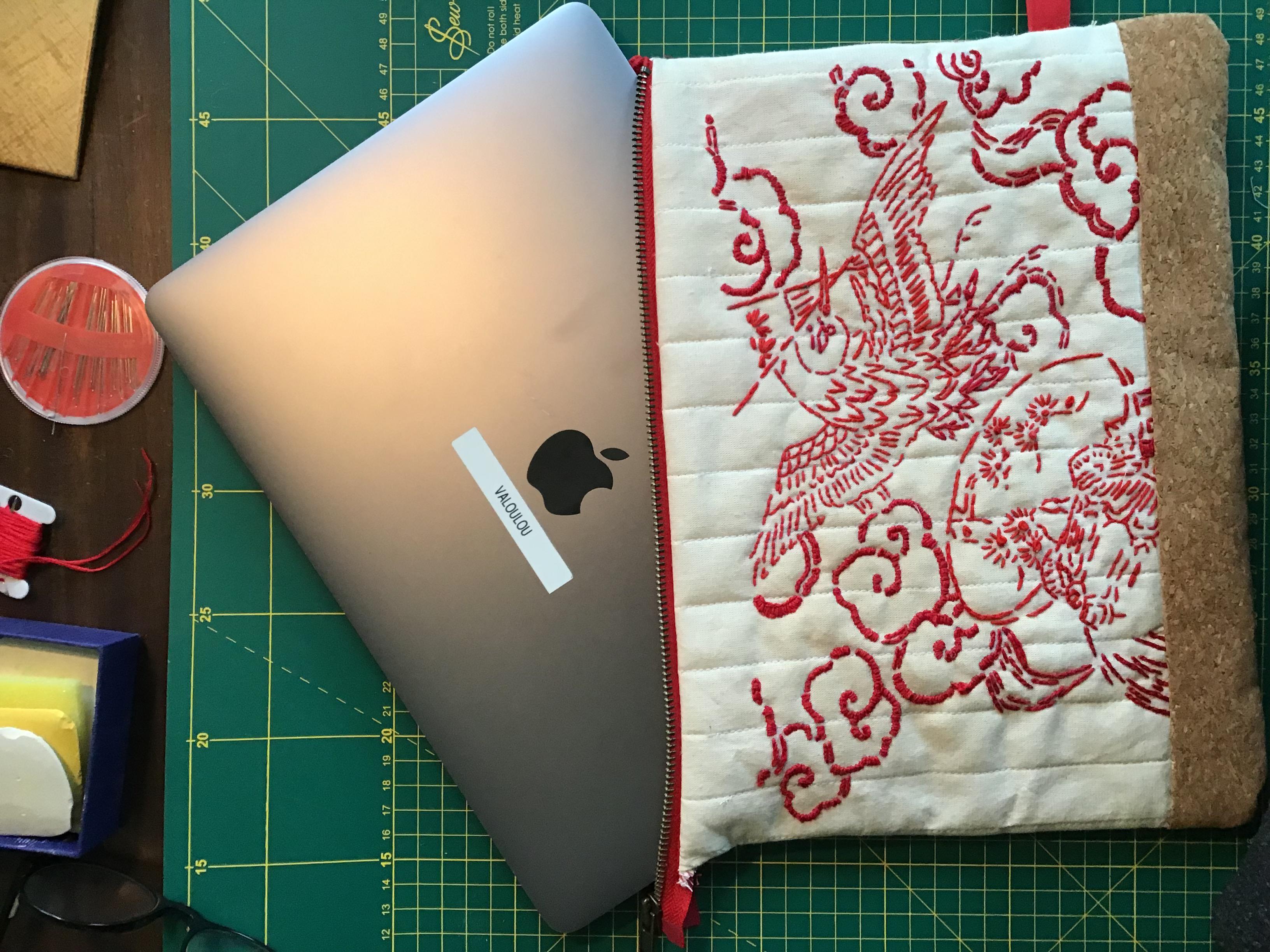 I did this laptop sleeve on embroidered quilt and cork. I messed up the