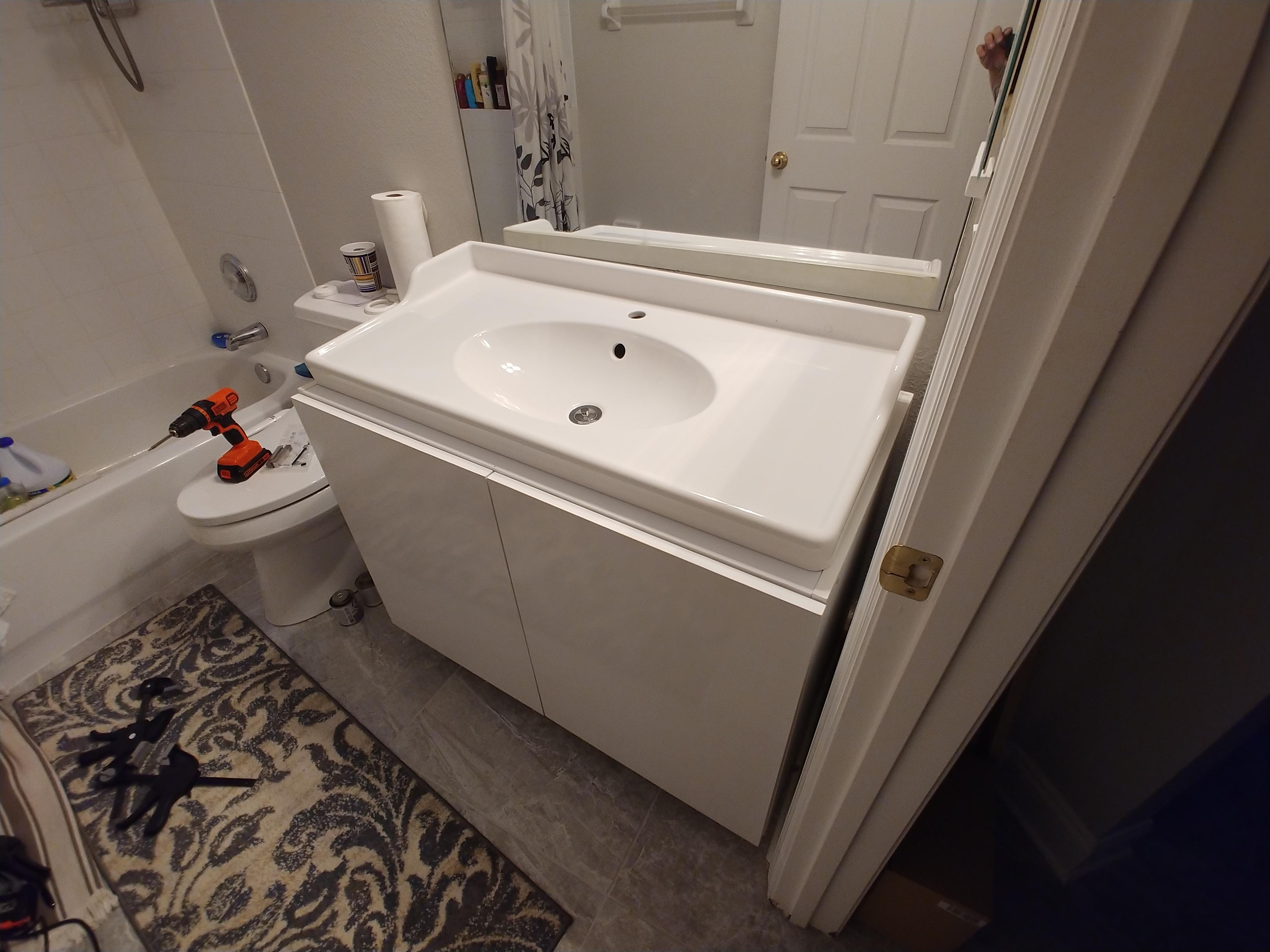 Bathroom vanity, made with plywood, melamine paint and white edge band