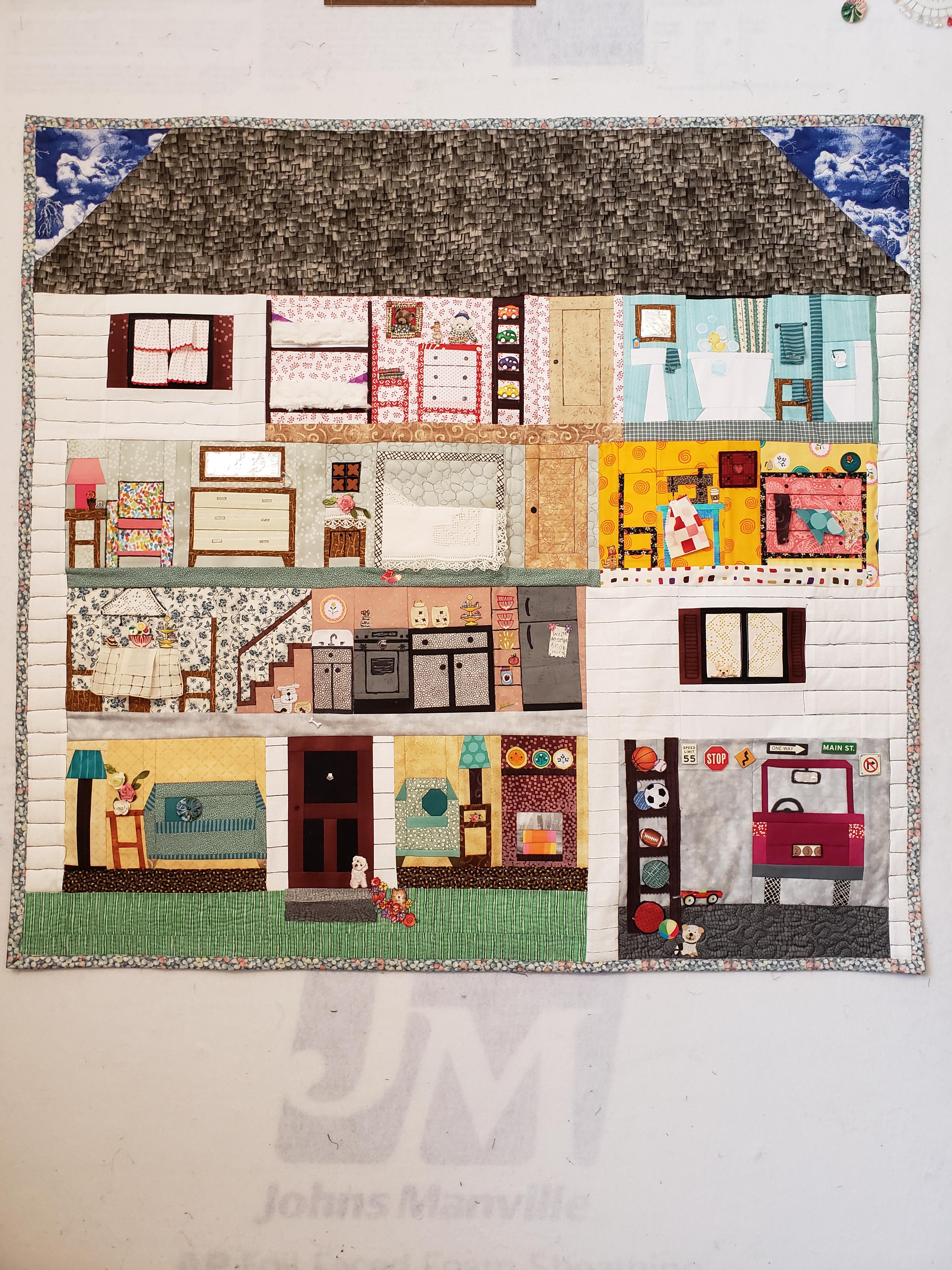 My granddaughter and I made a dollhouse quilt. (I had to include a wild