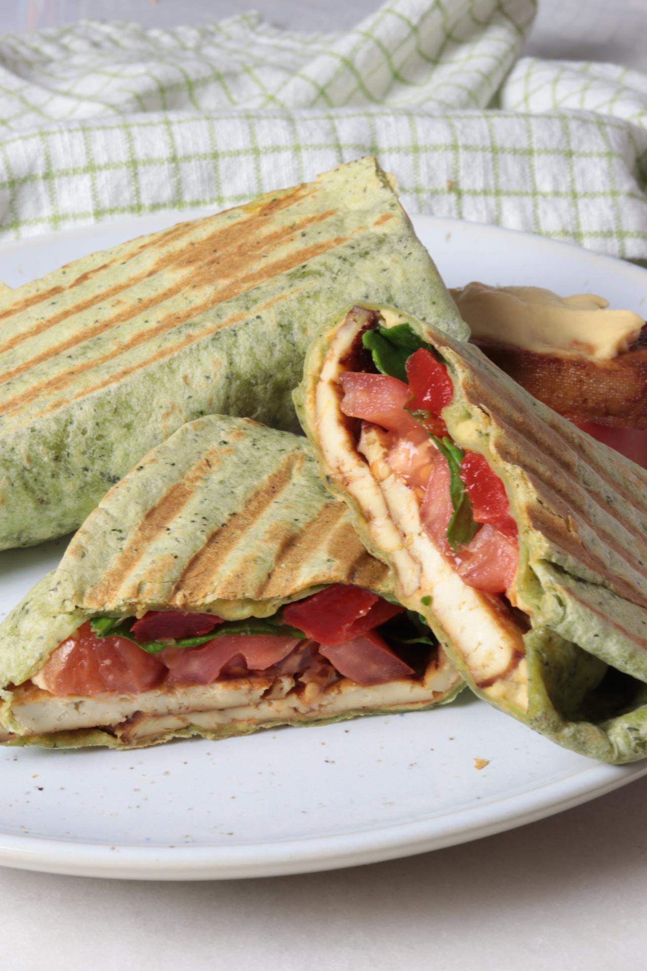 Made some wraps on a panini press. Tofu, tomato, spinach, roasted red