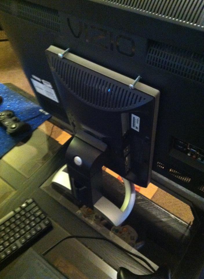 TV stand broke, built a new one with a couple screws and an old monitor