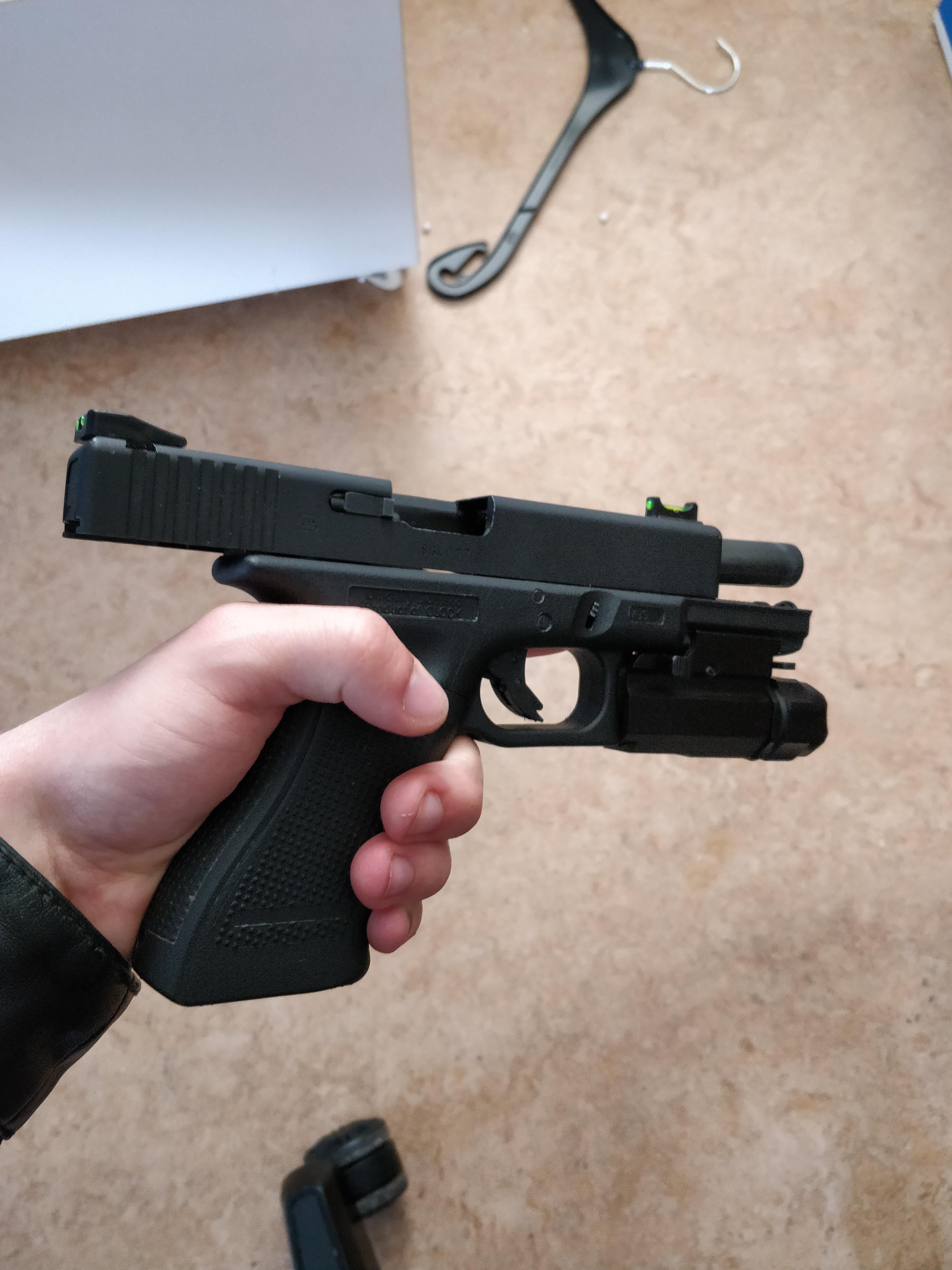 My new sidearm, glock 17 with modified tfx glow sights an a strobe