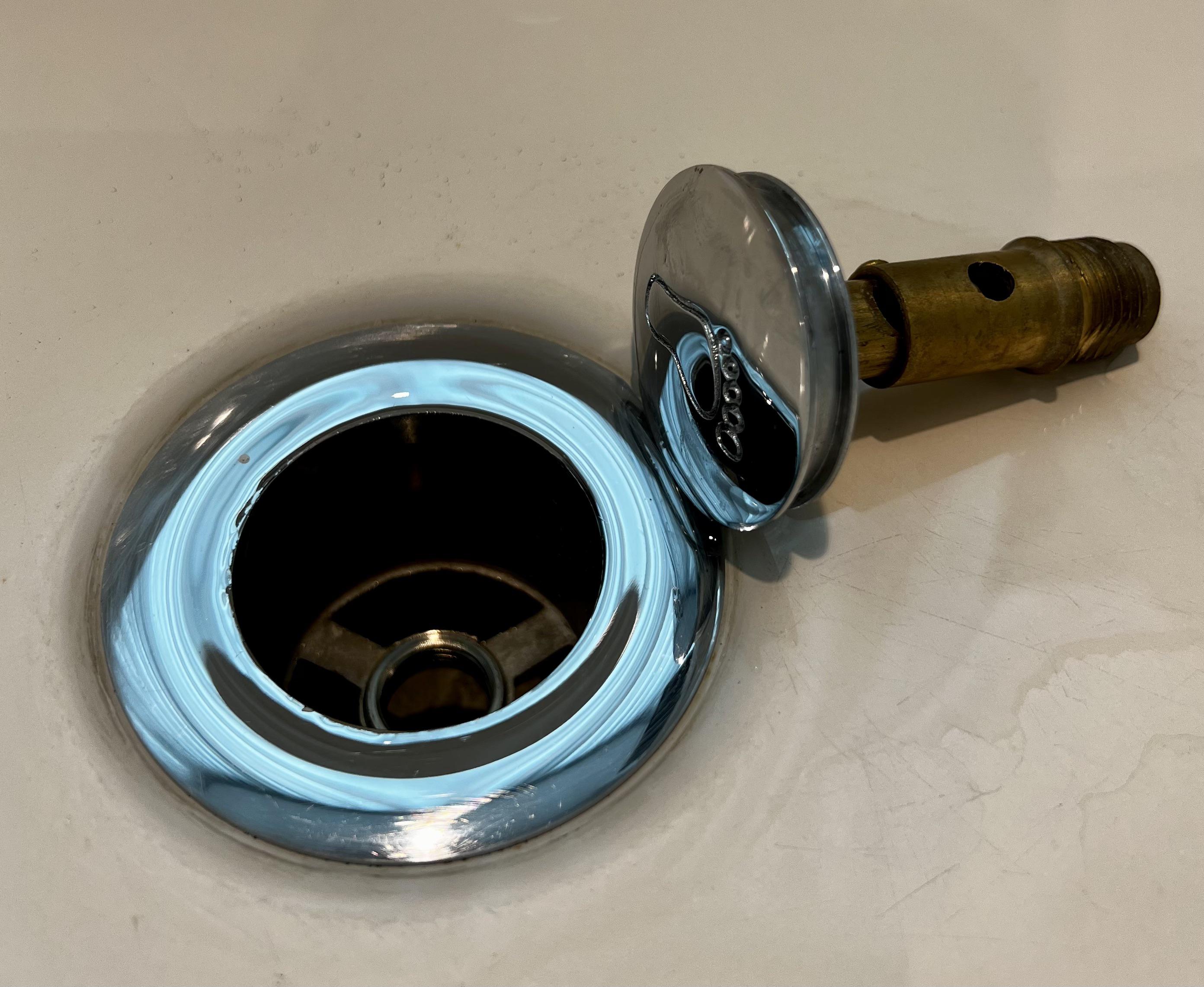 Can anyone tell me this pop up tub stopper brand? r/Plumbing
