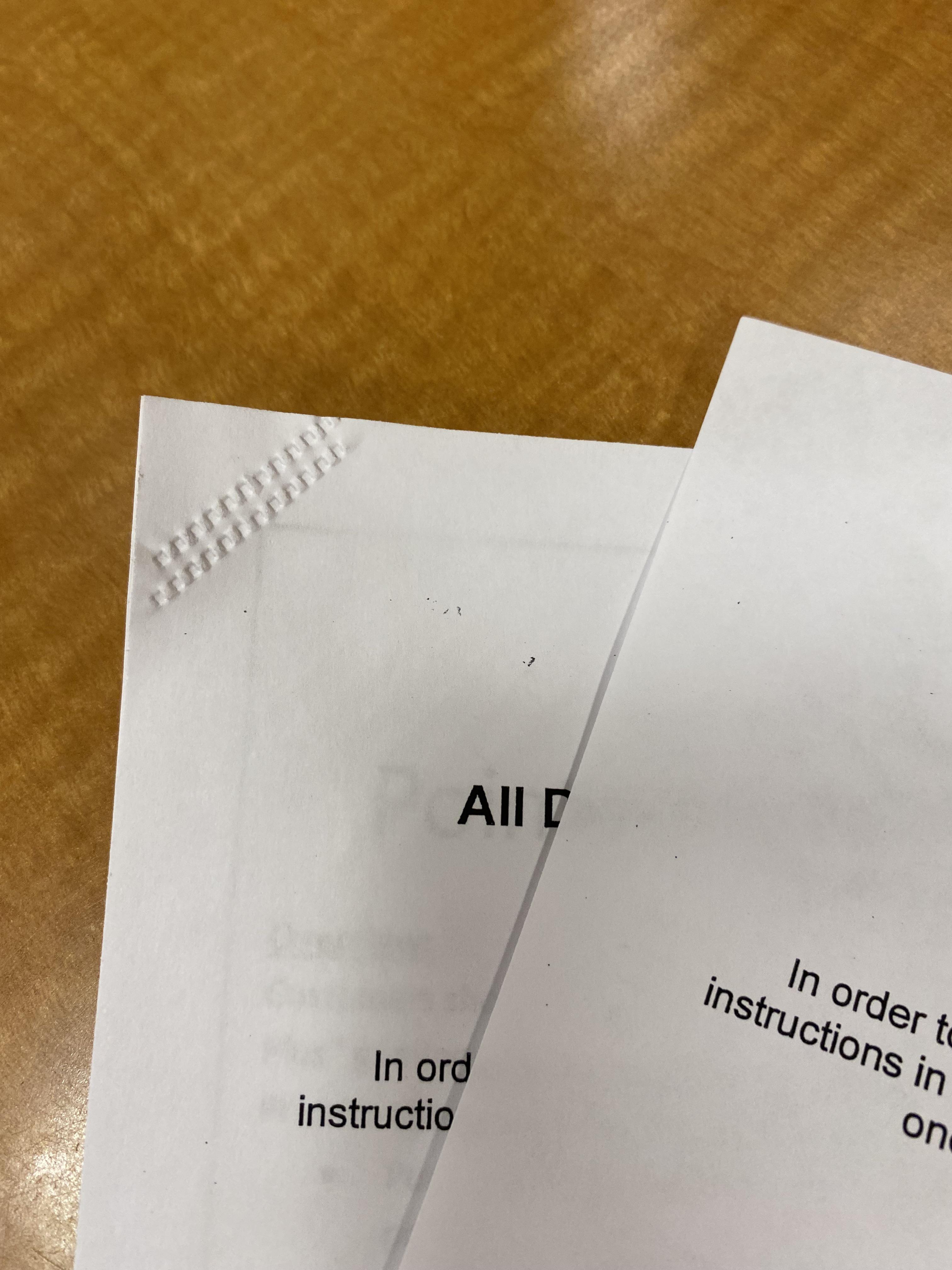 This packet of paper is stapled without a staple r/mildlyinteresting