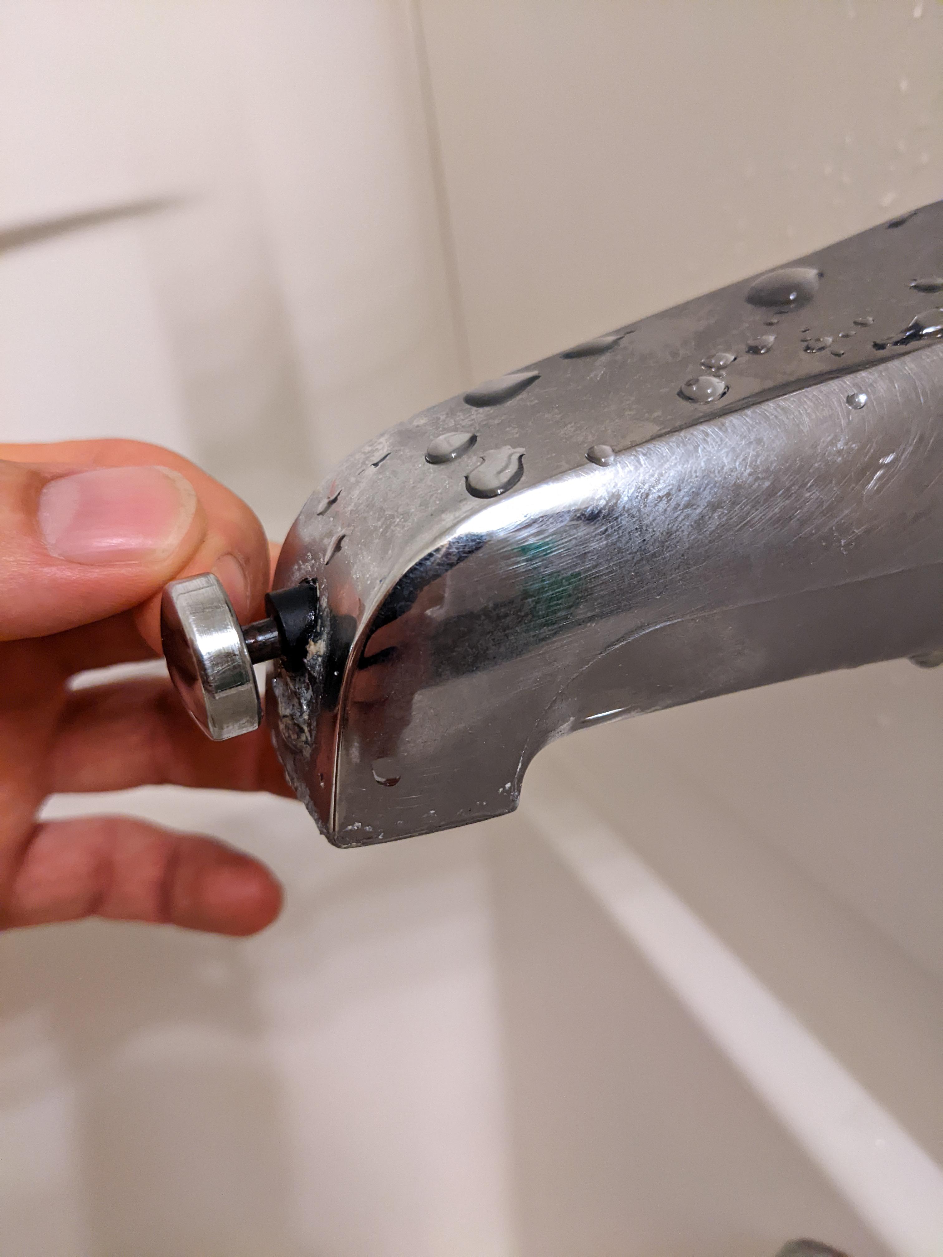 Please Help. Shower diverter in apartment pops out into shower mode as