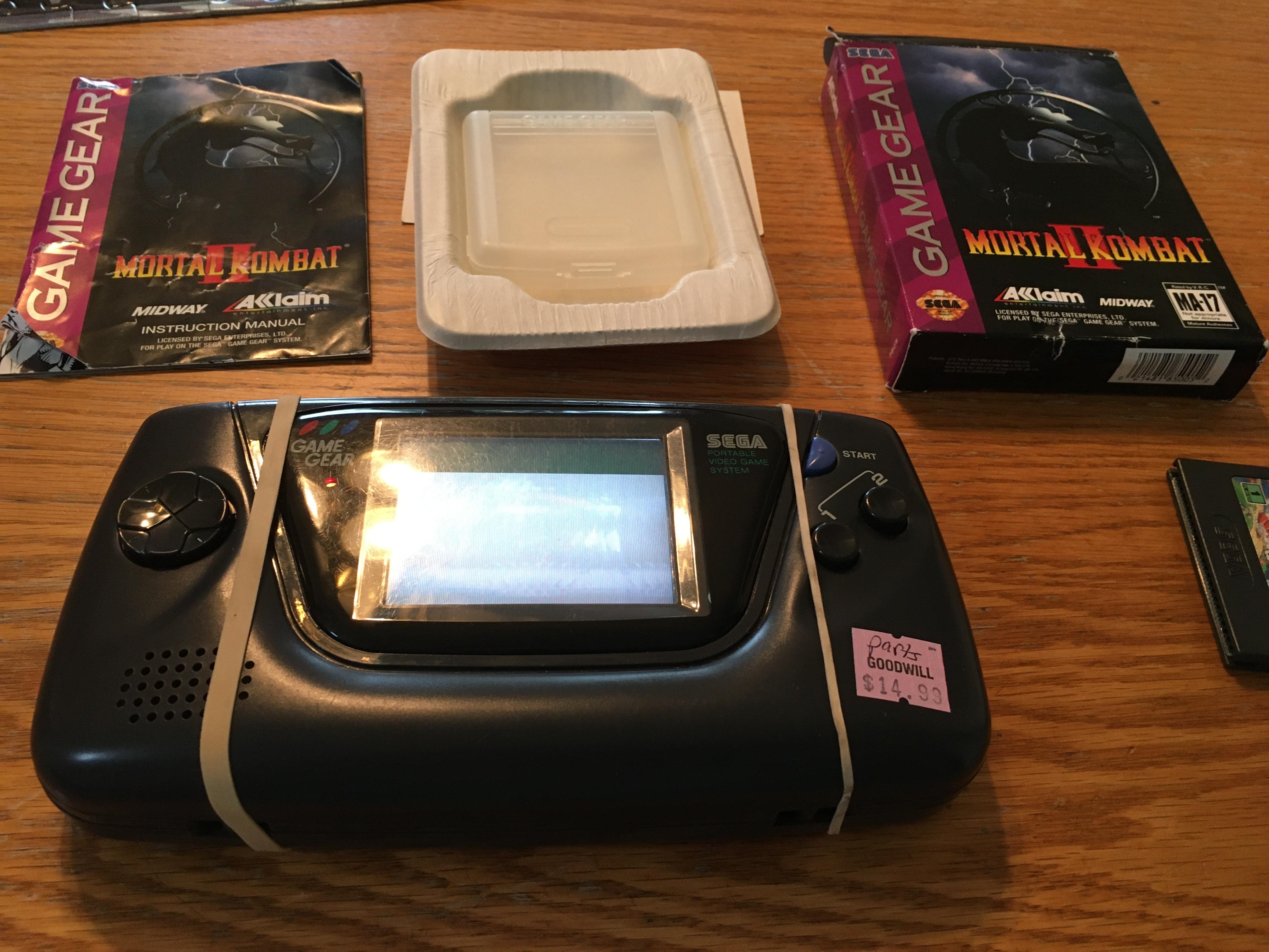 Picked up a complete in box copy of Mortal Kombat 2. The top 1/5 of my