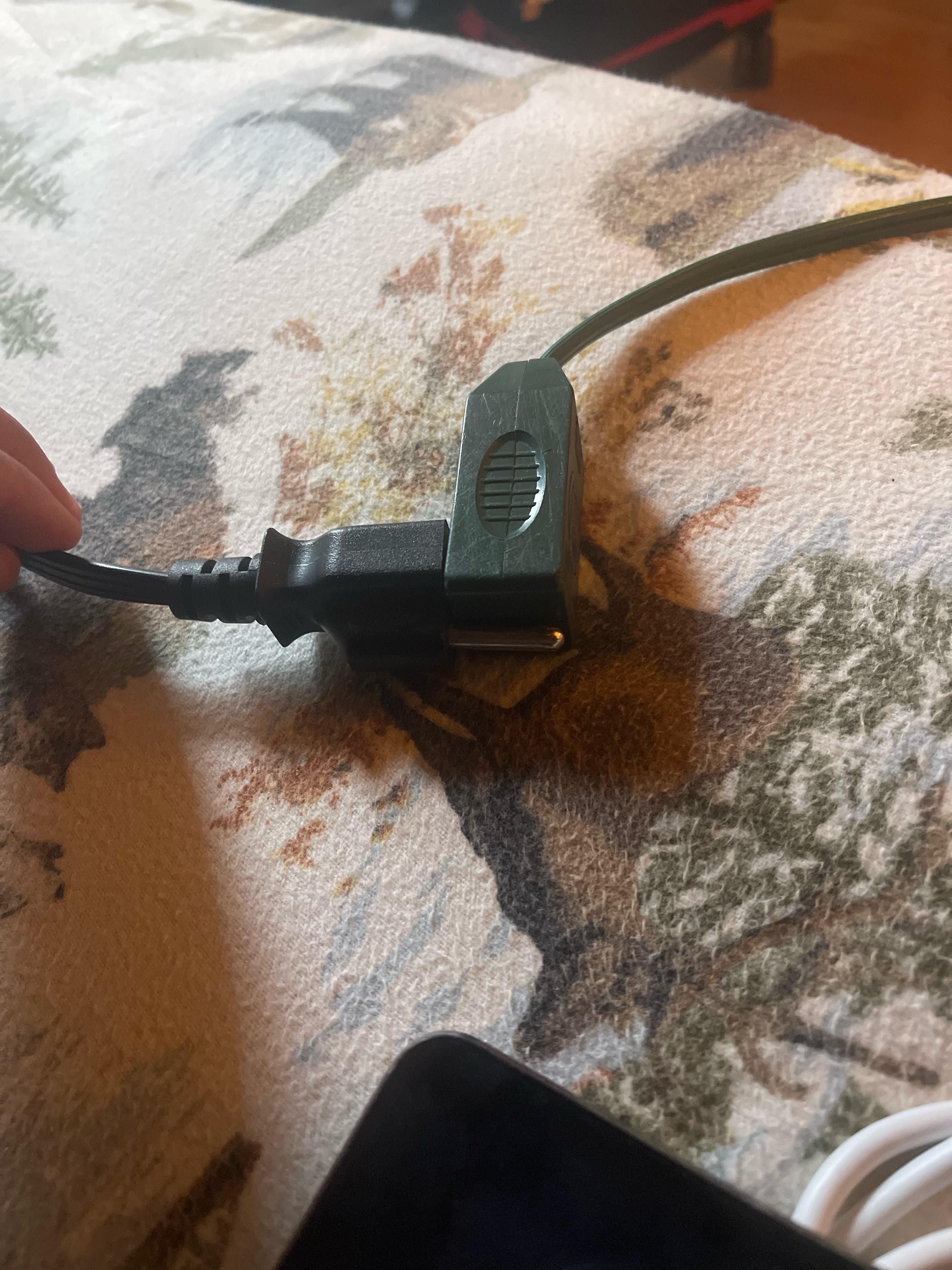 Is this safe? Three prongs in a two prong outlet? : r/electricians
