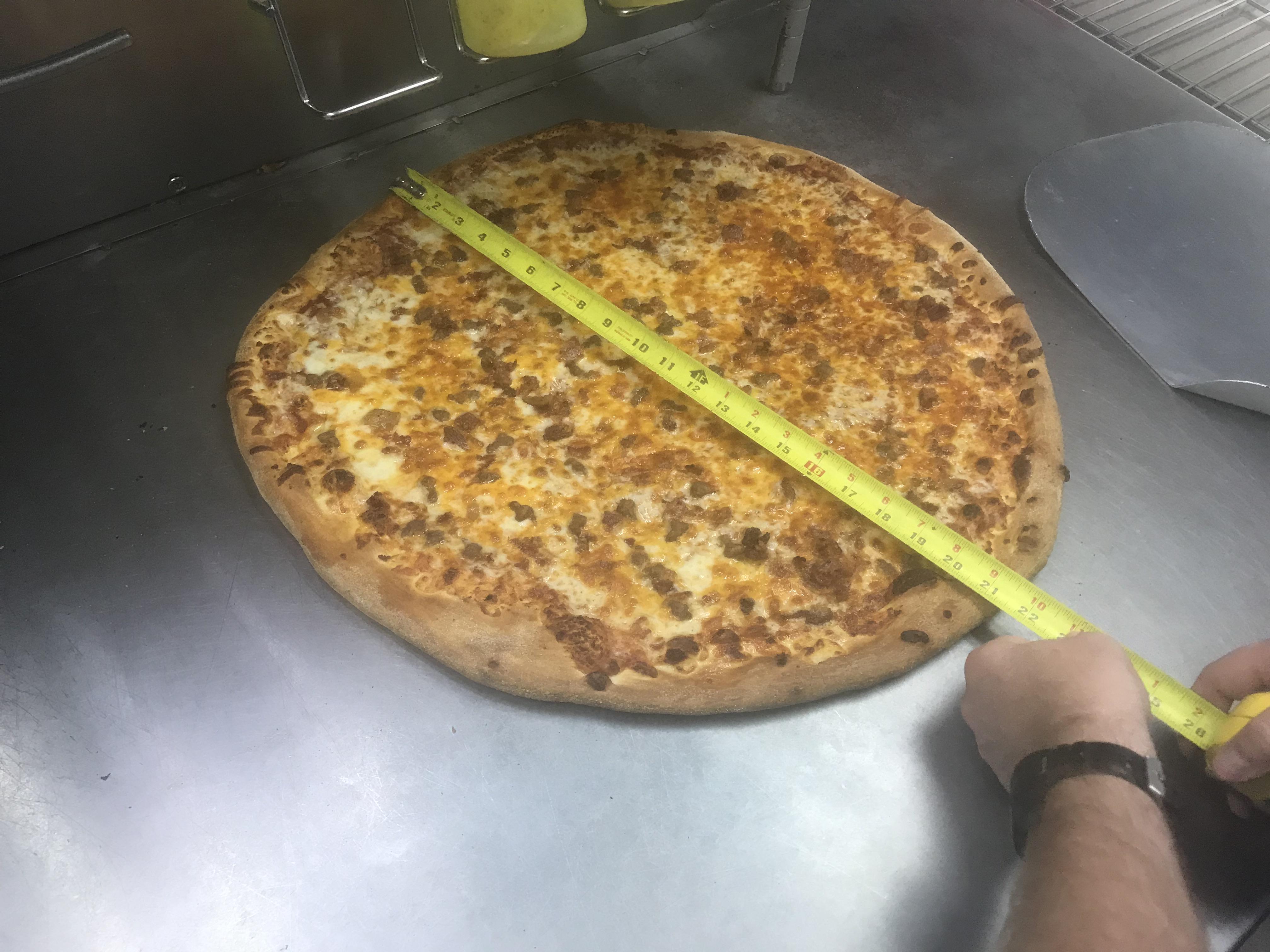 Made a 22 inch pizza today because we got sent XL dough by mistake r