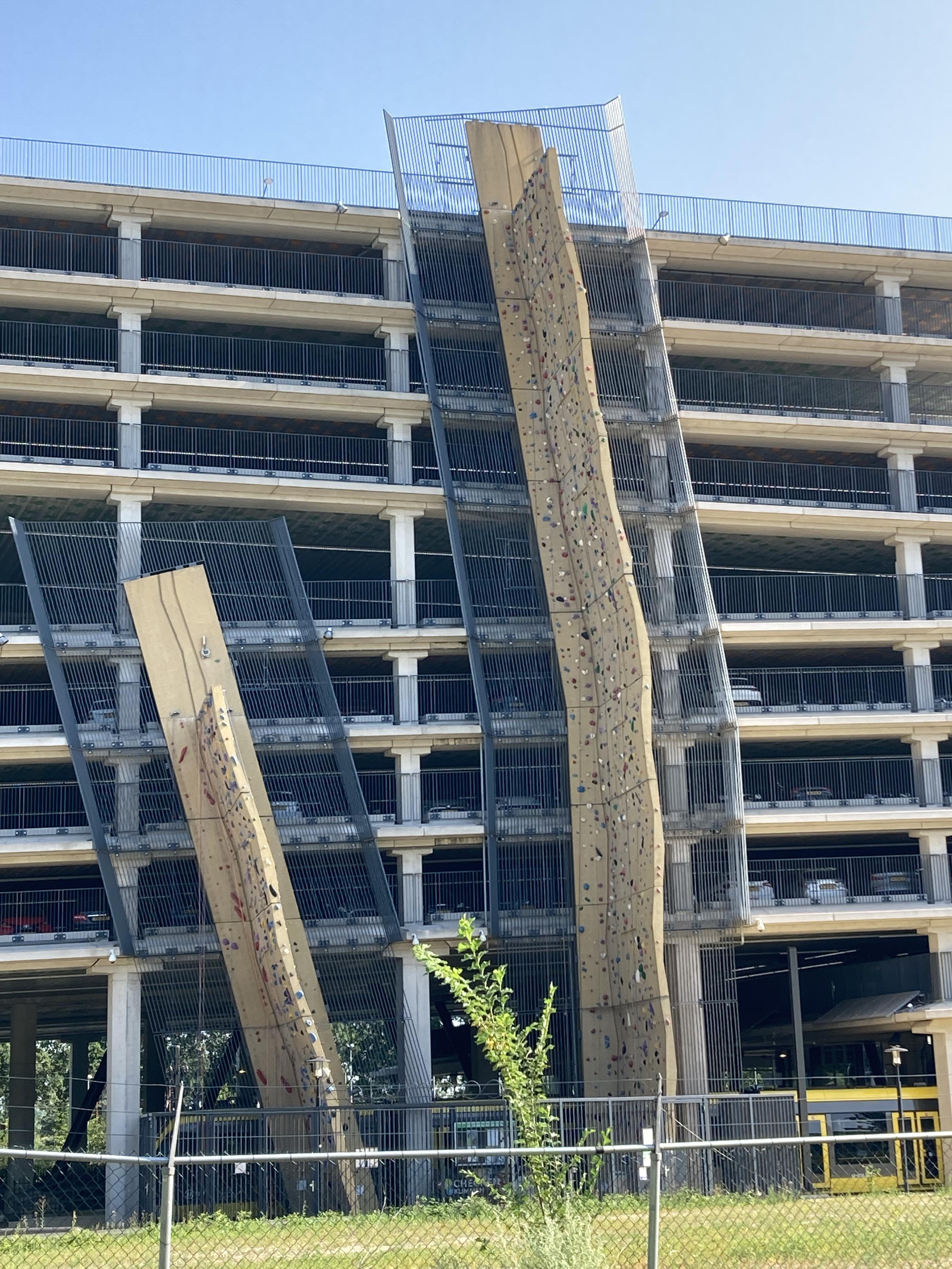 Climbing wall along a parking in Utrecht campus r/mildlyinteresting