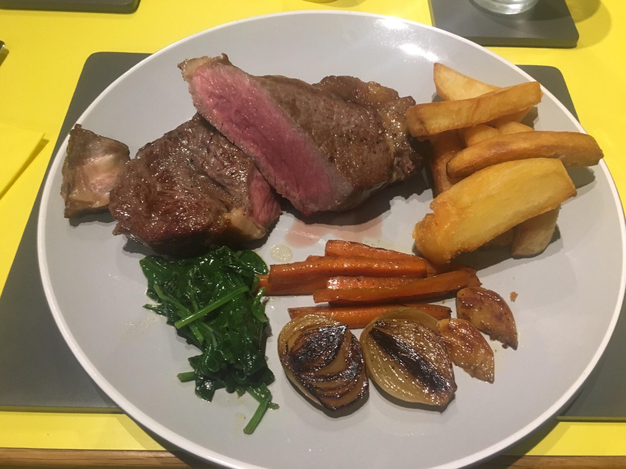 Sirloin (NY Strip) with chips, onion, garlic, glazed carrots and