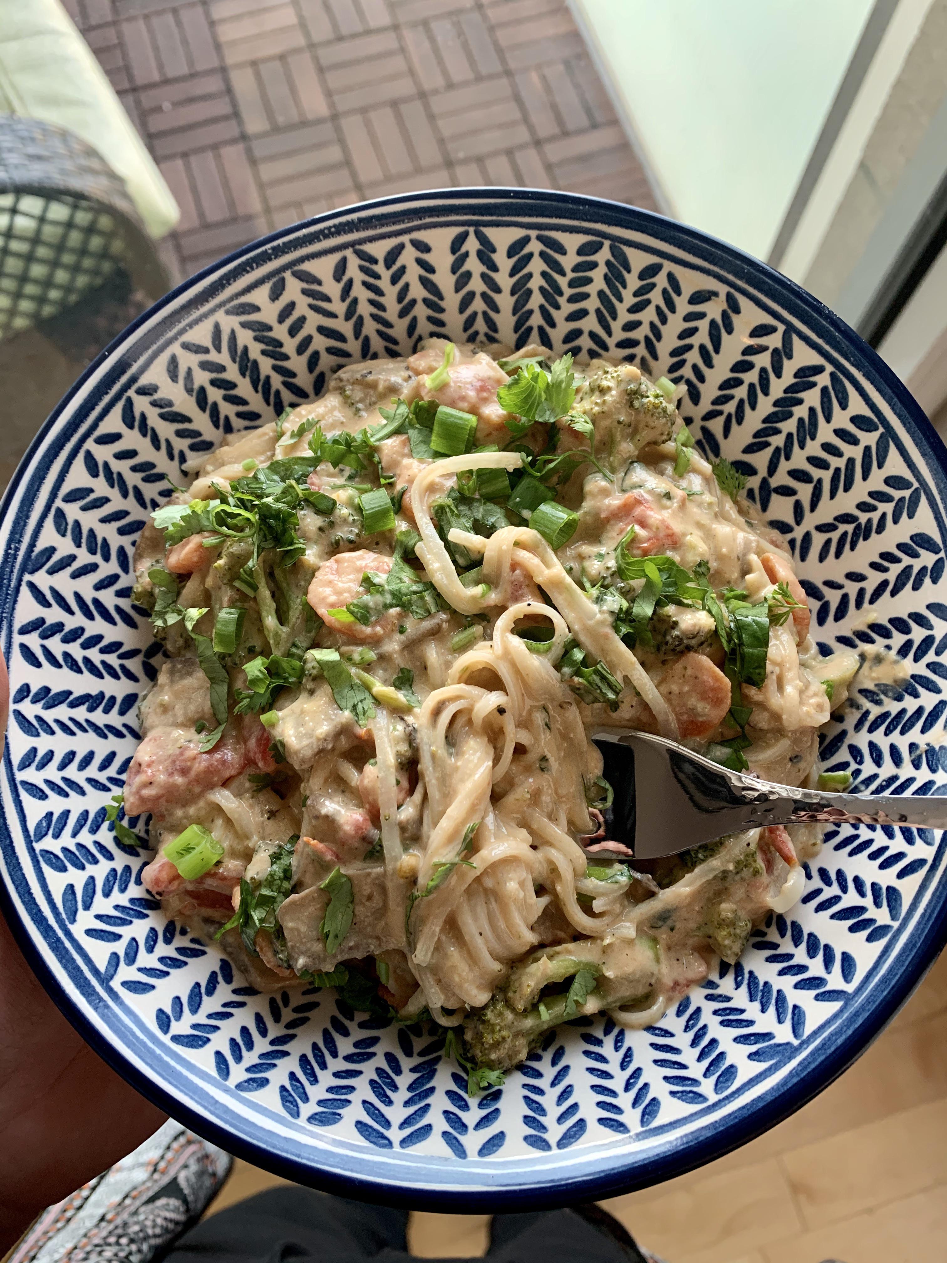 Spicy tahinibased sauce with rice noodles and loads of veg & herbs