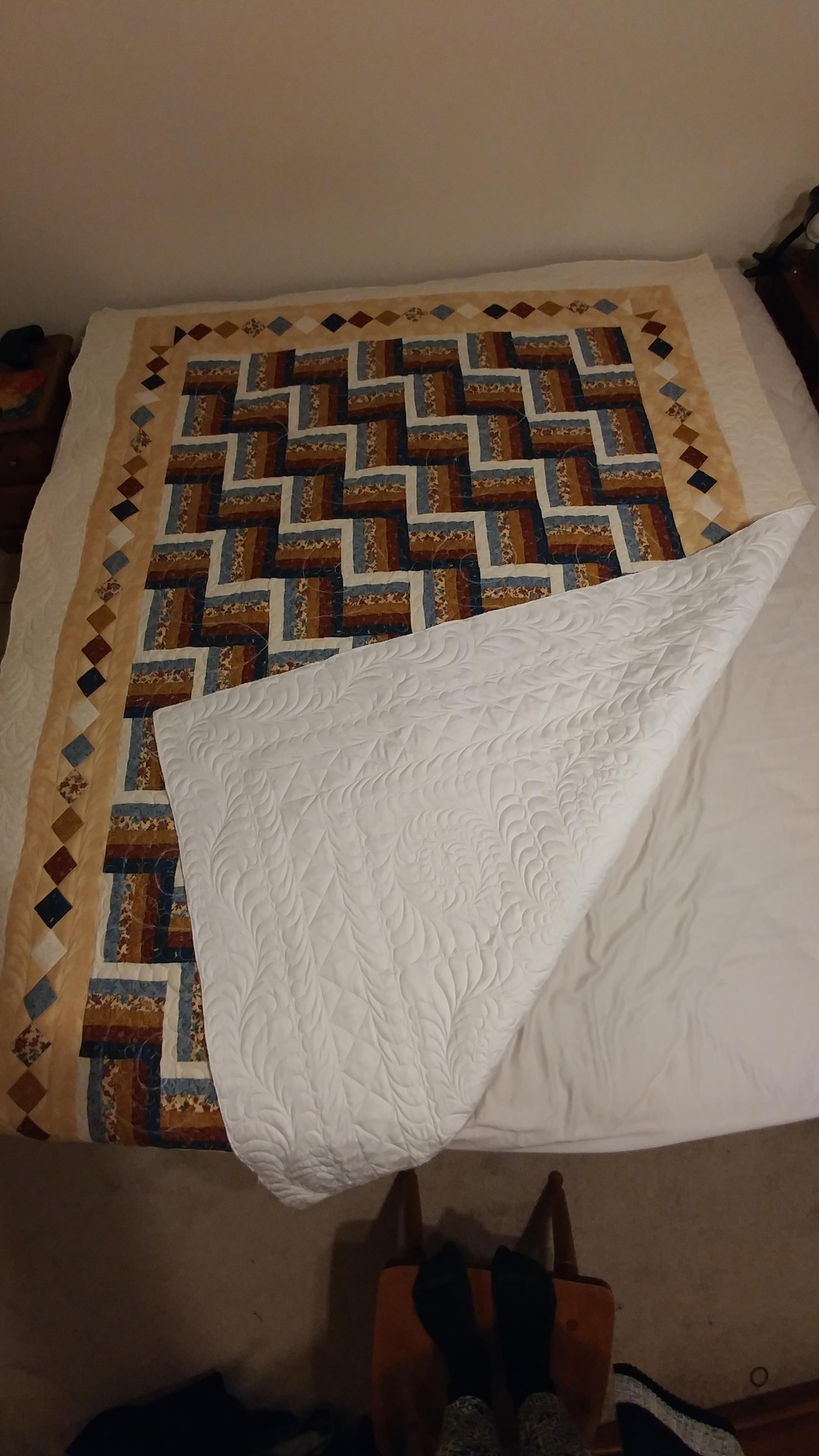 I just finished top quilting this beauty! All I have left is the