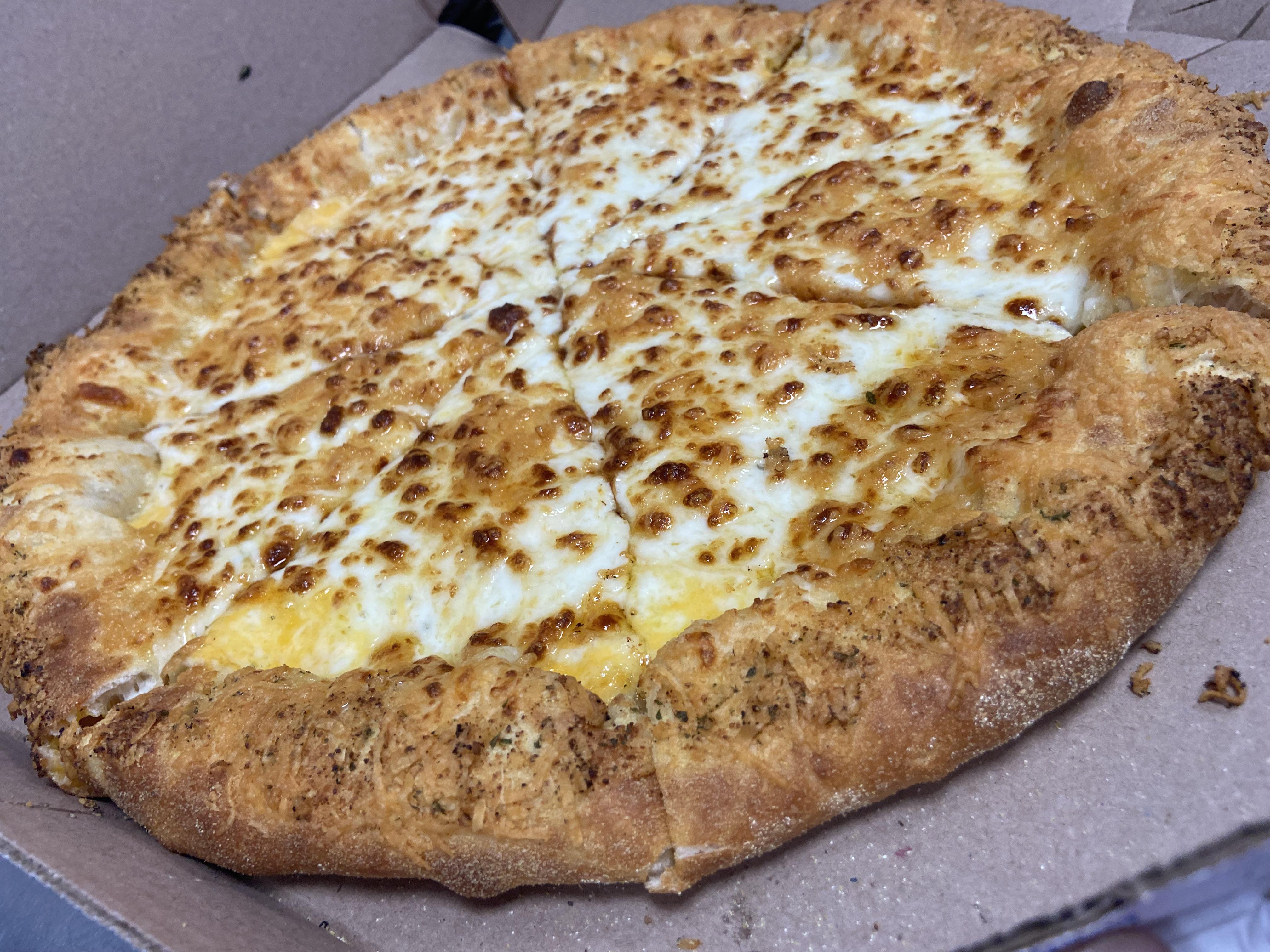 Stuffed crust Wisconsin 6 cheese with garlic Parmesan sauce. Garlic oil