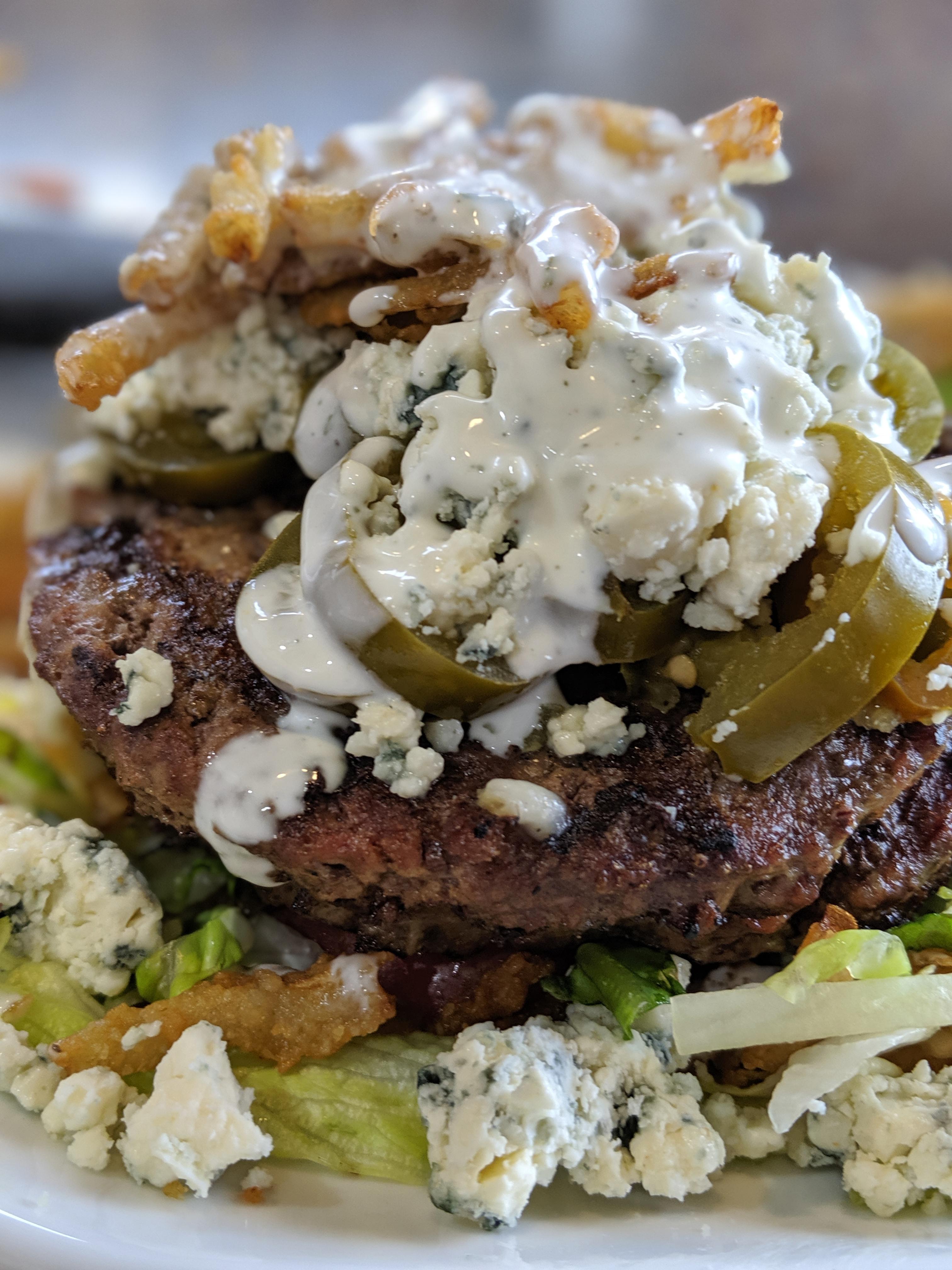 Low carb Creation at Bostons pizza. Double paddy, no bun, blue cheese