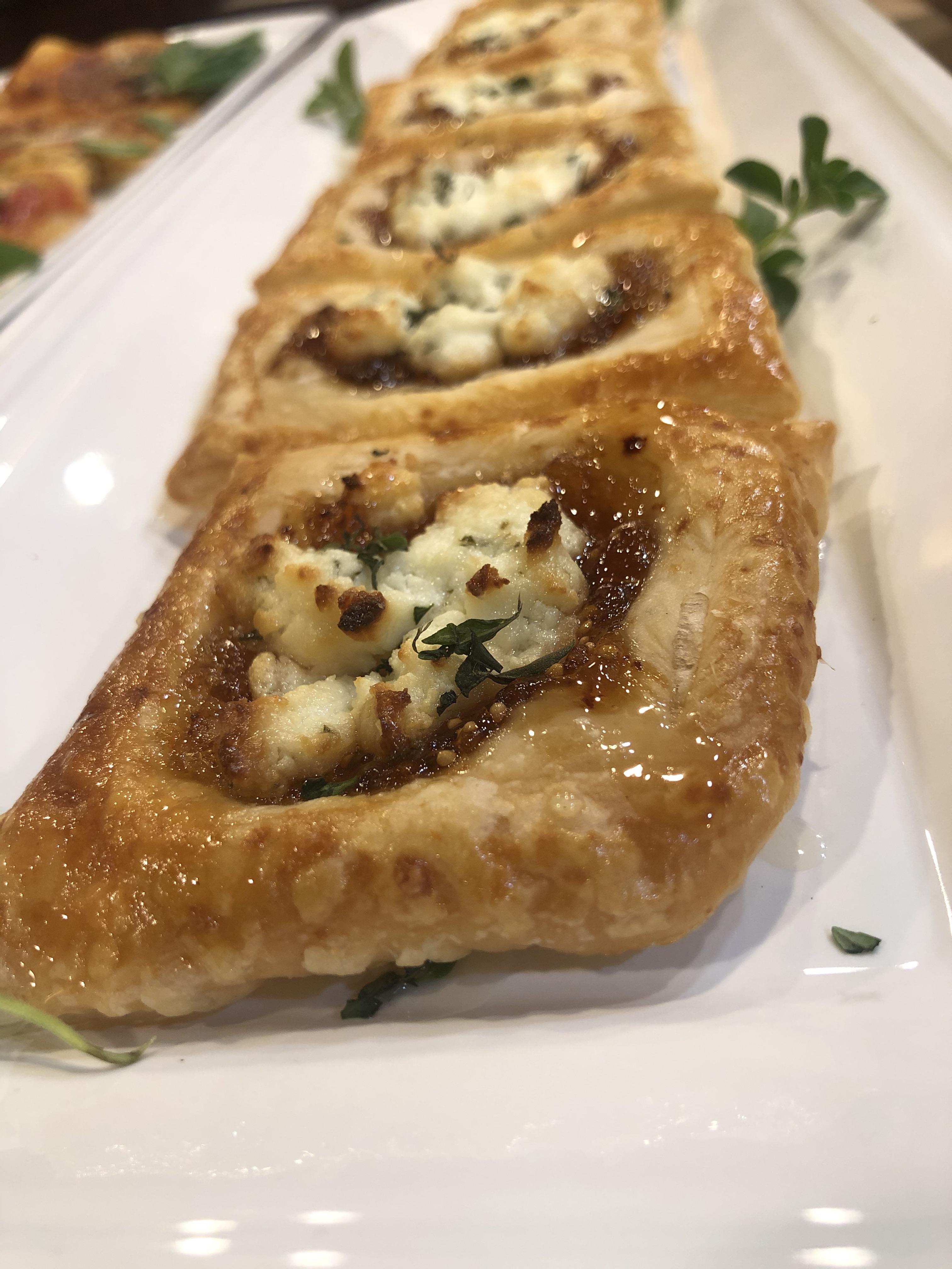 Homemade puff pastry with fig jam, goat cheese, fresh thyme, and a