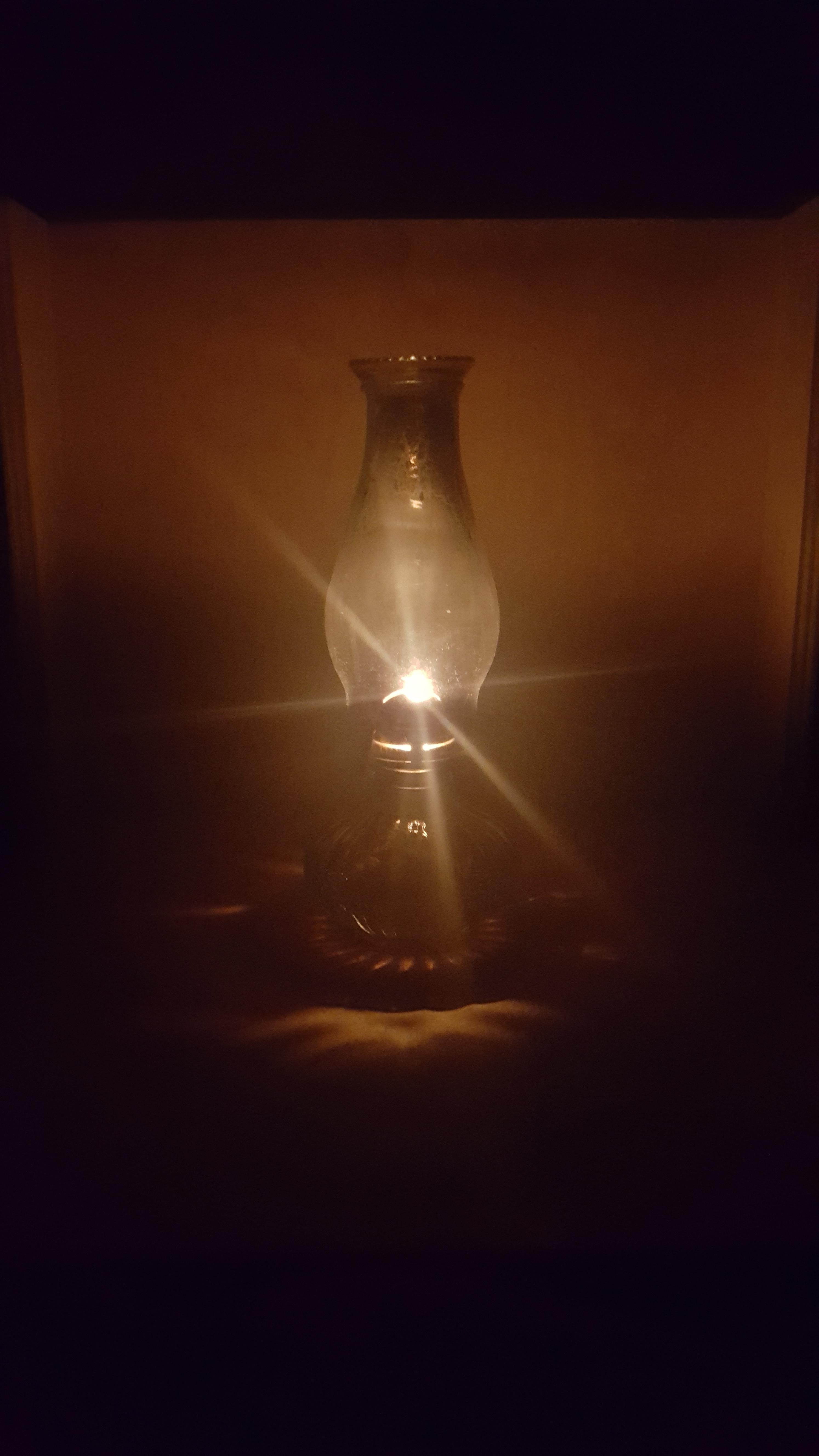My lantern on my porch. Thought the pic looked pretty cool. : r/pics