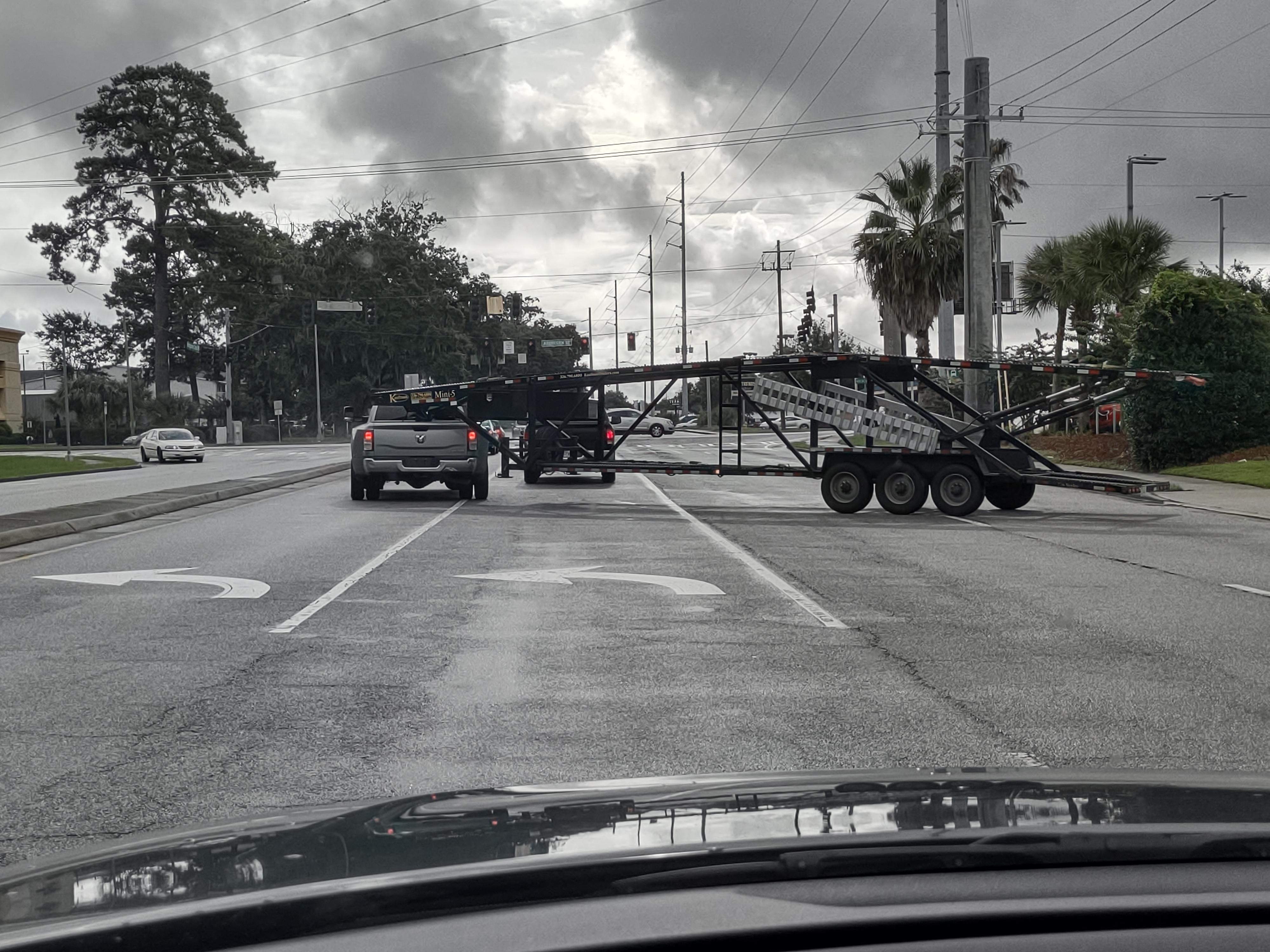 He rolling stopped a stop sign and blocked four lanes of traffic