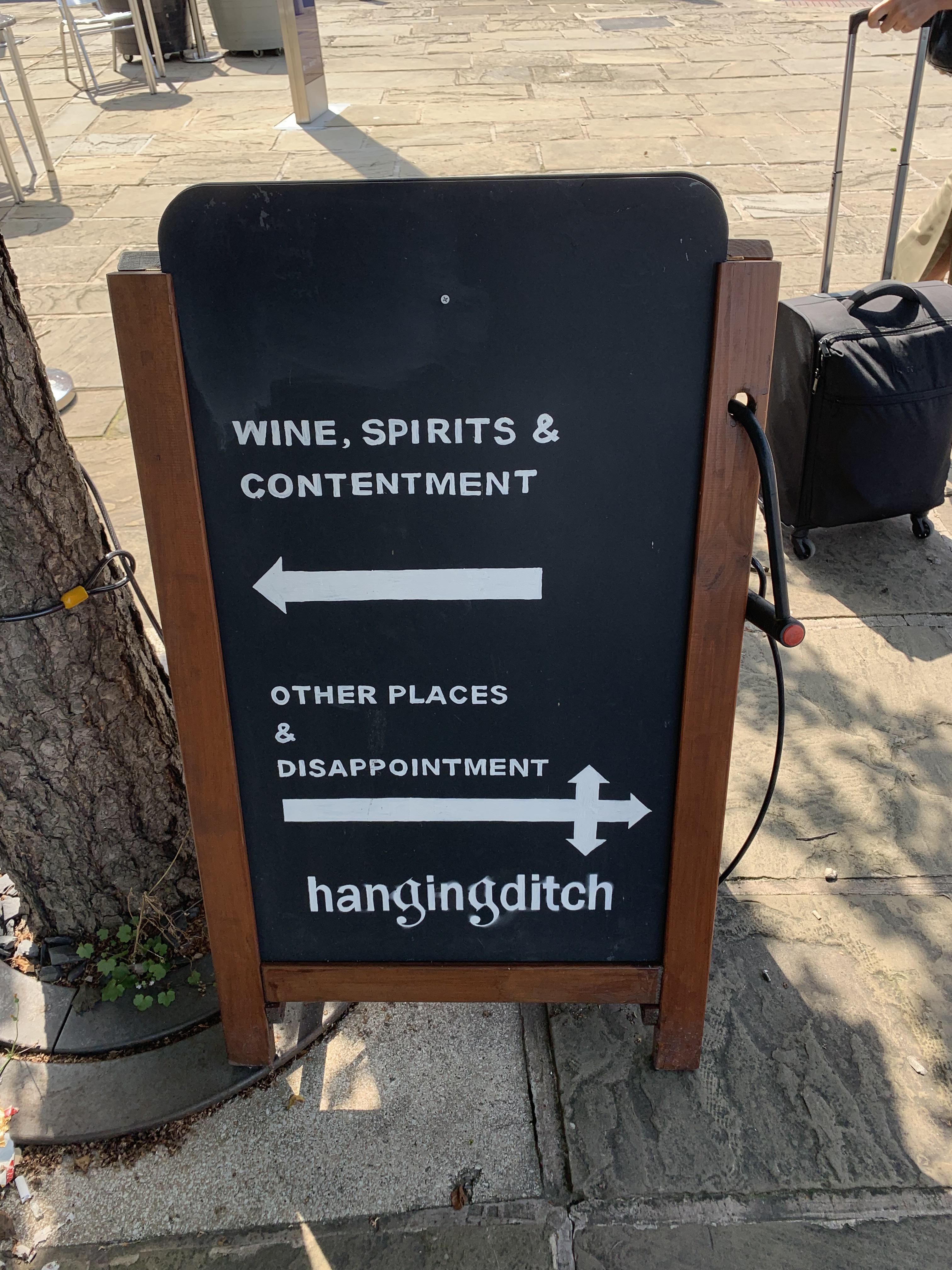 Sign outside fine wine shop near Selfridges. It got me to go in. r