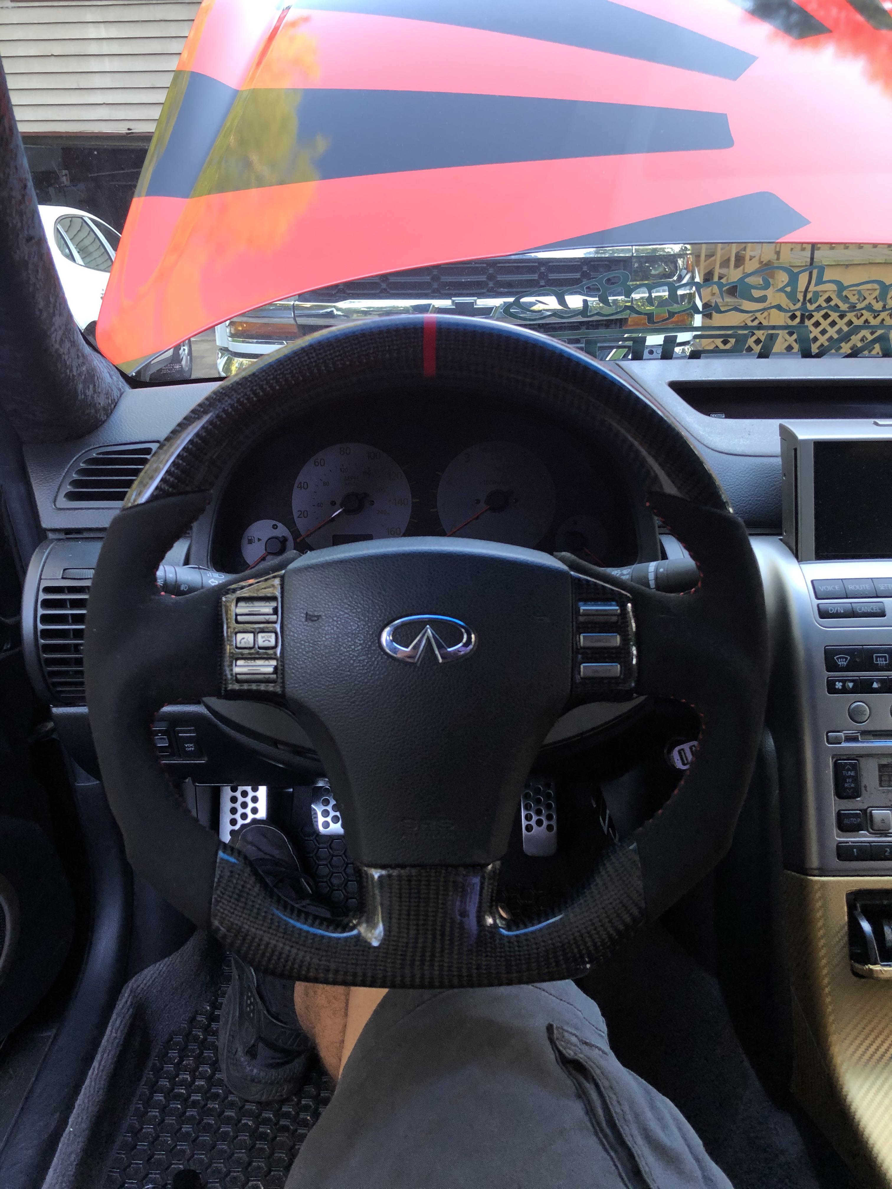 Recently installed this custom carbon fiber steering wheel with