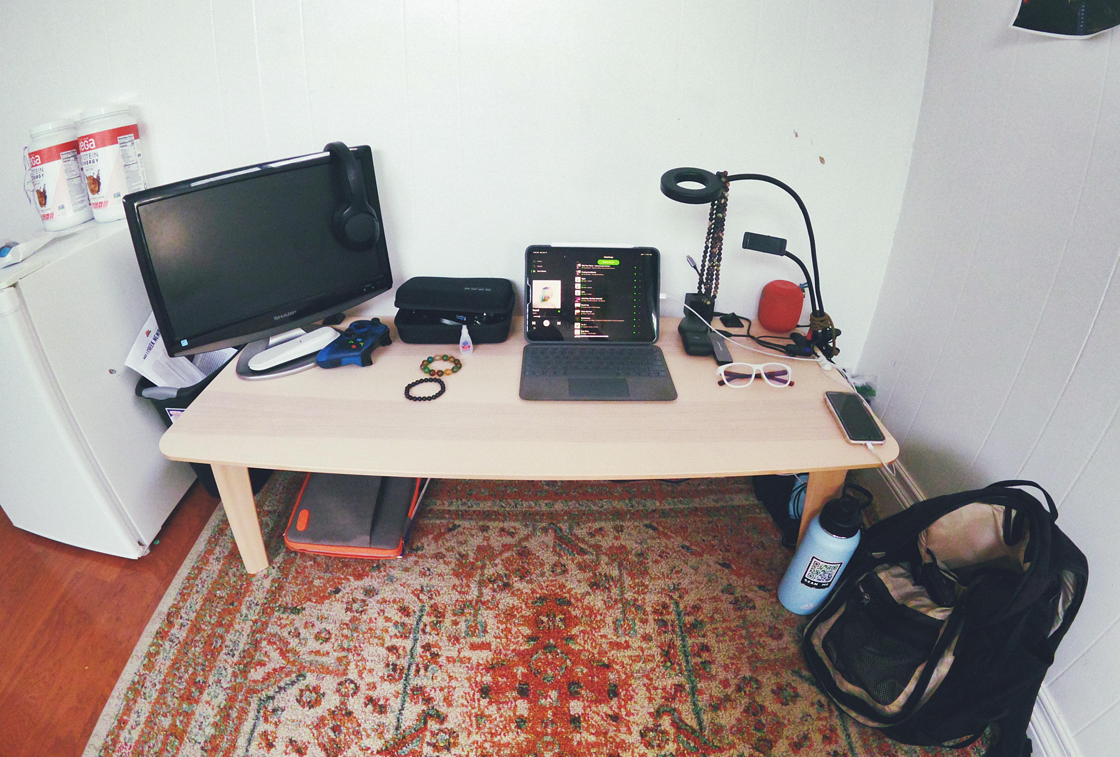 Here is my floor sitting, gaming setup. streaming stadia on my iPro, or