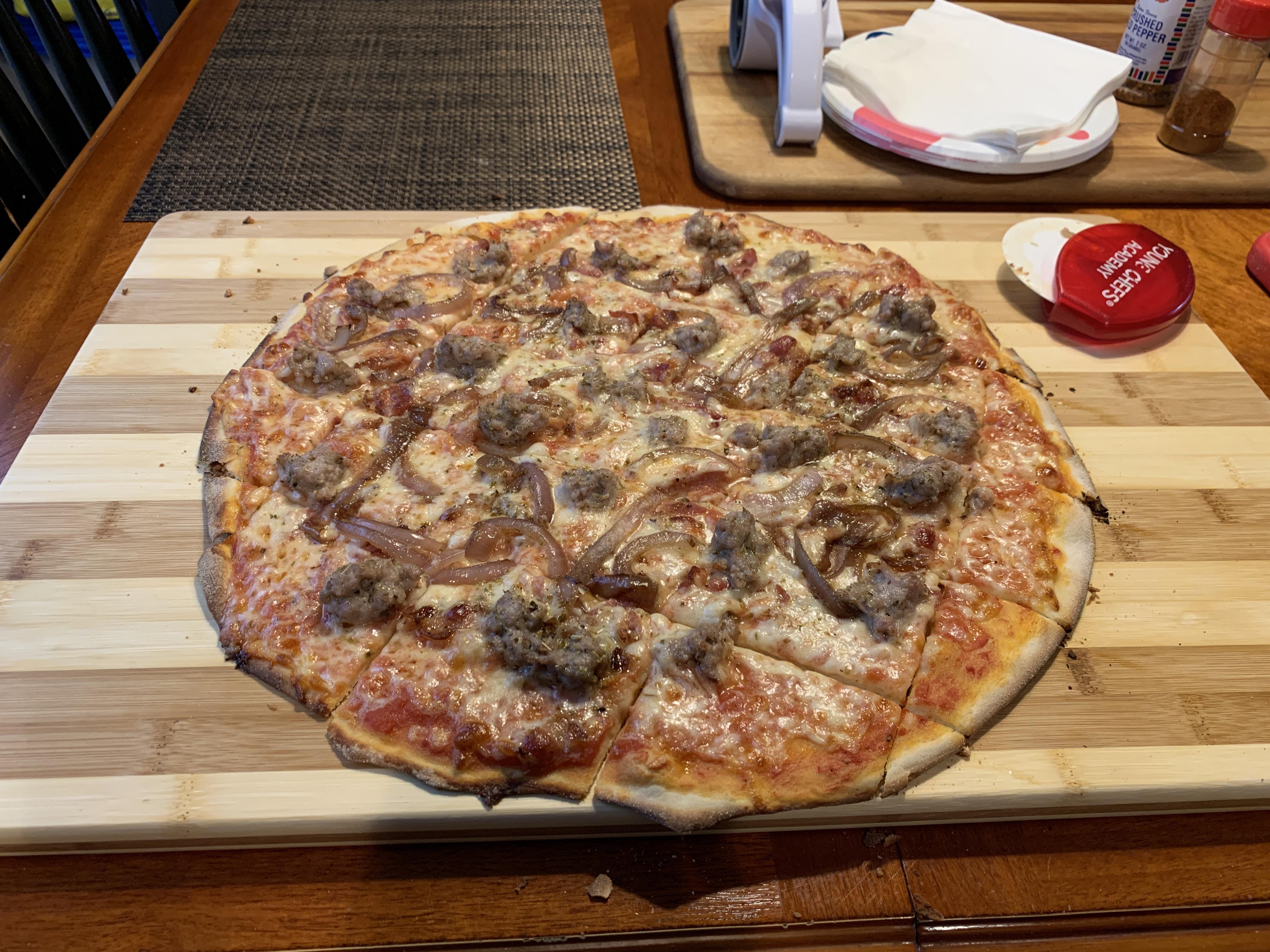 Chicago style thin crust. Tavern style cut. r/Pizza