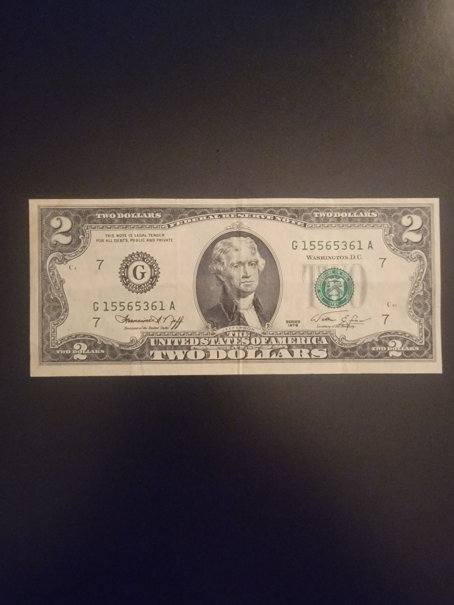 2 bill worth anything? 1976 low serial number r/Money