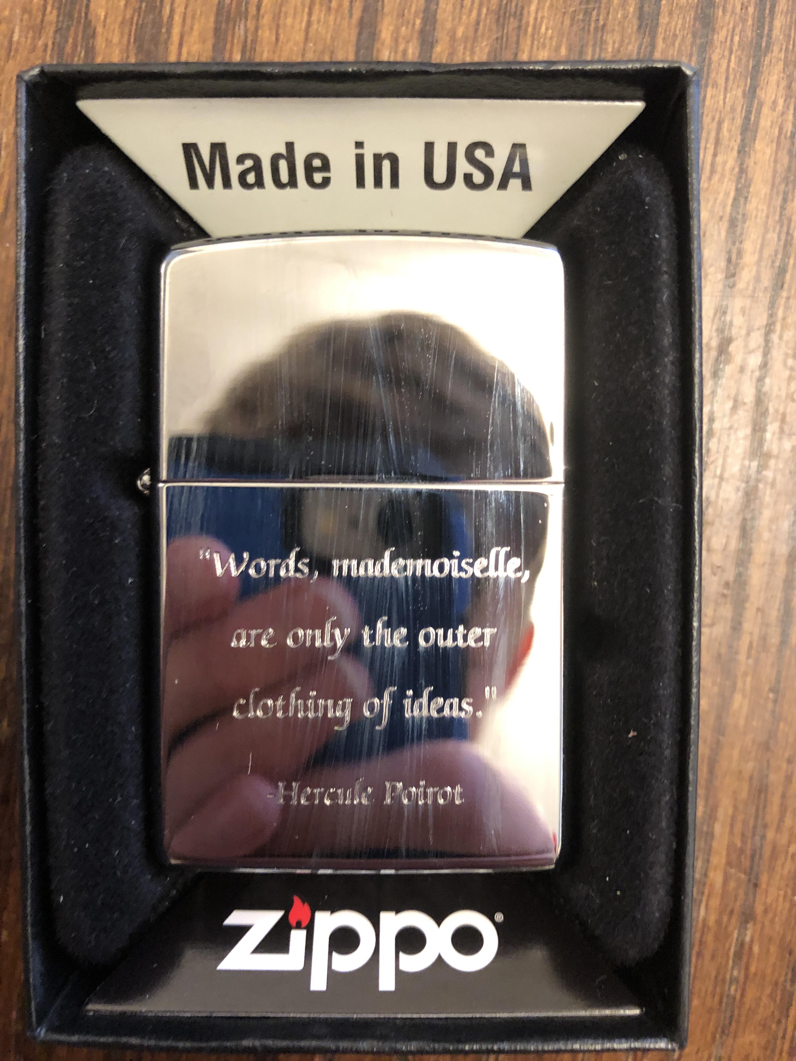 Birthday present from a friend a Zippo with a quote from Poirot on it