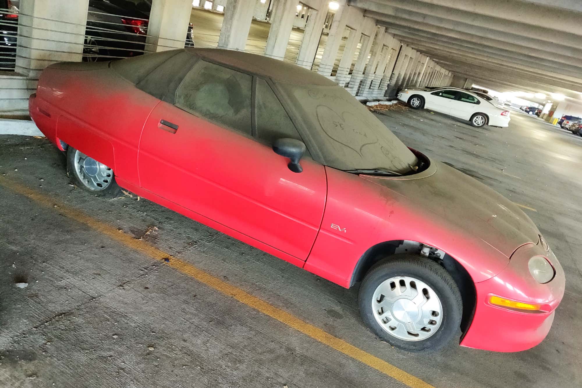 The Saturn EV1 that's hidden away in a parking garage somewhere in