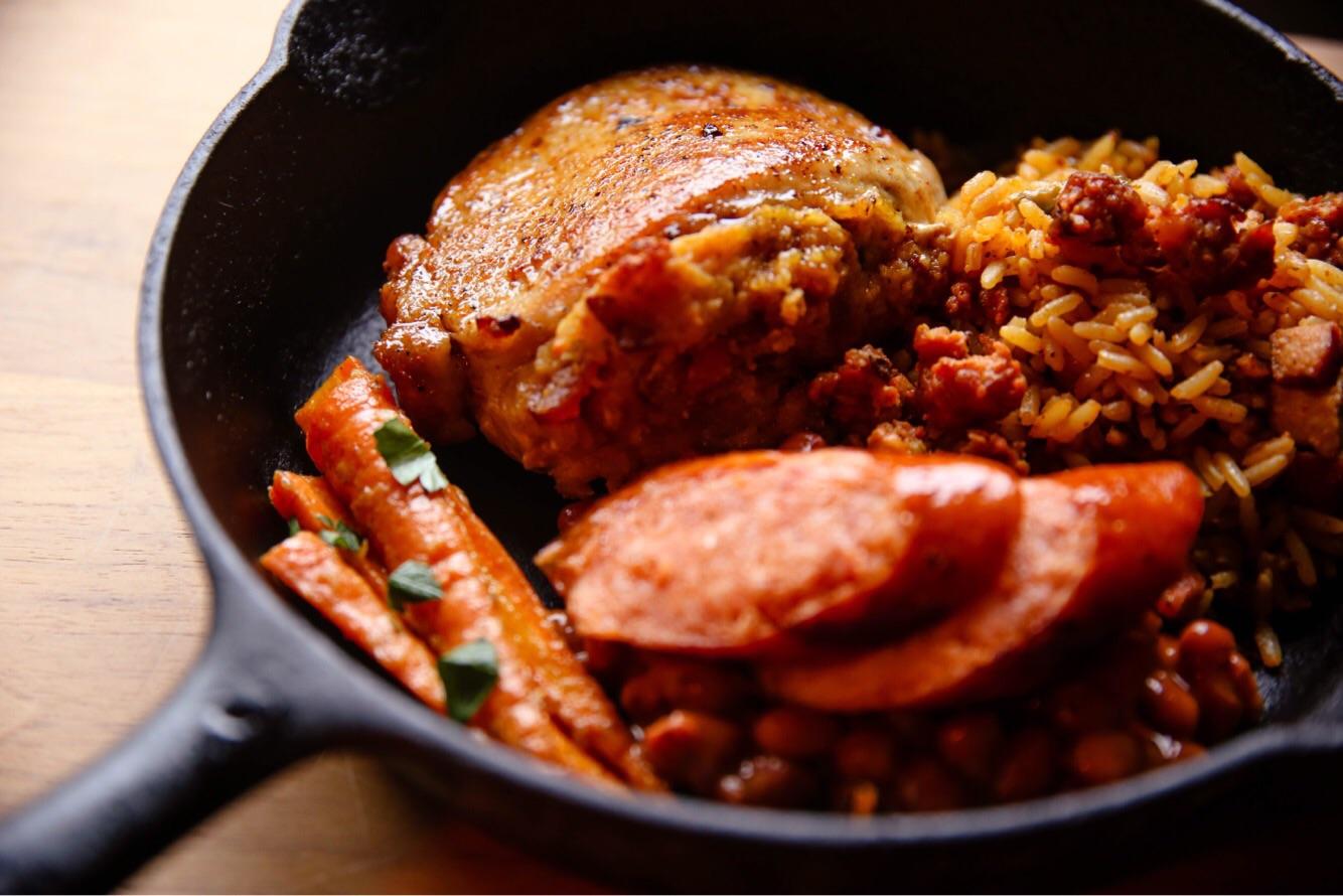 [homemade] Cajun stuffed pork chops, dirty rice, red beans, andouille