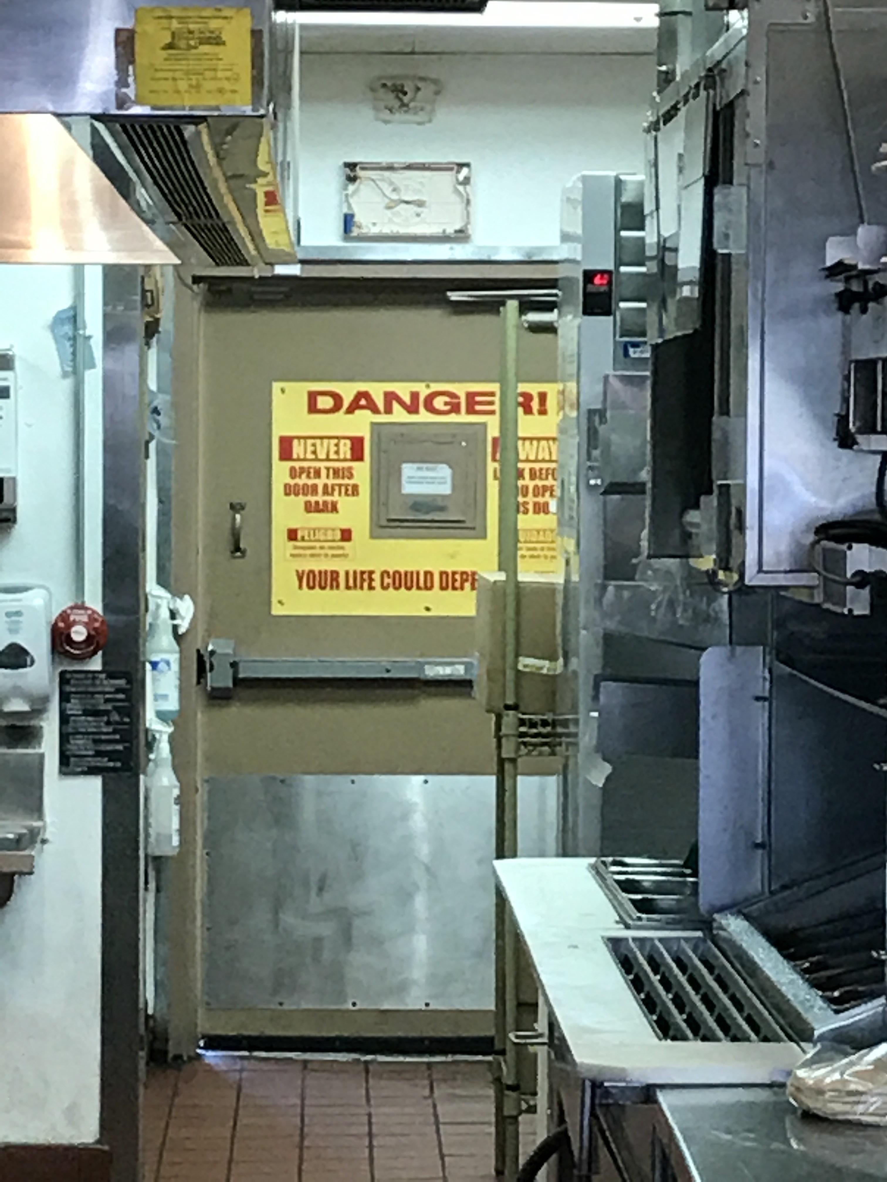 This Warning on the Back Door of a Fast Food Restaurant r