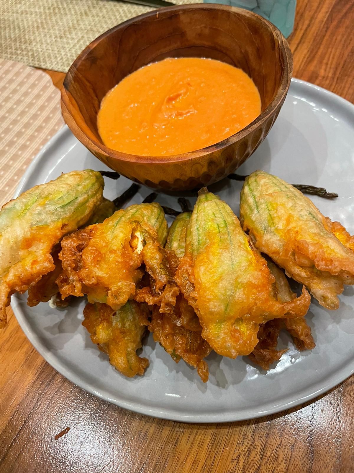Homemade tempura fried zucchini flowers stuffed with ricotta, and