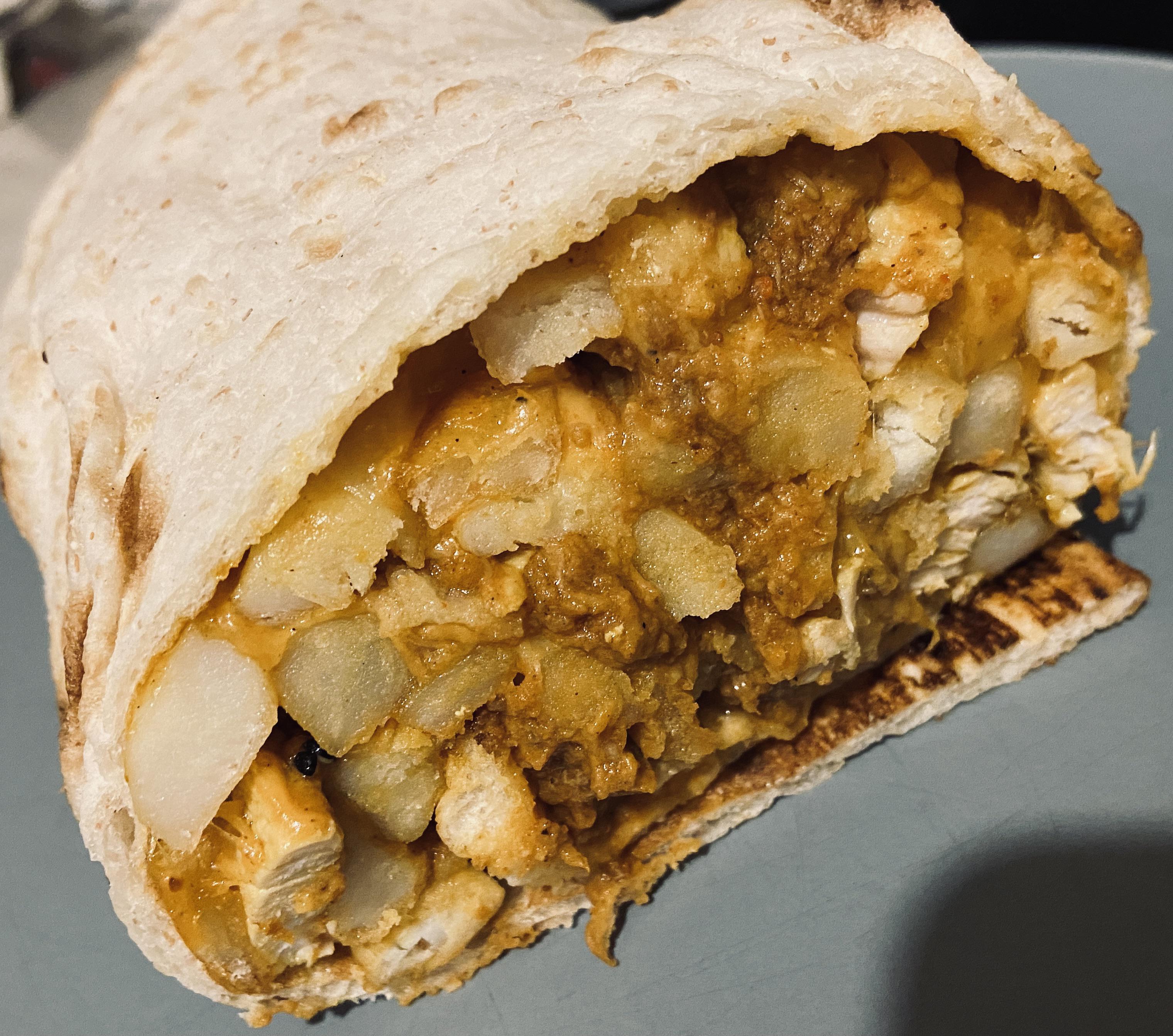[homemade] Durban Roti chicken chip and cheese with mutton gravy r/food
