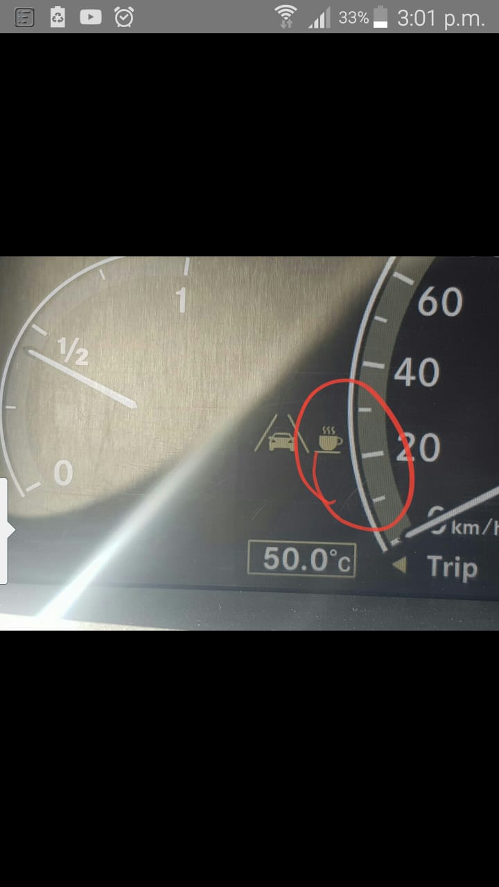 Why is there a cup of coffee light on my dashboard? Whatisthis