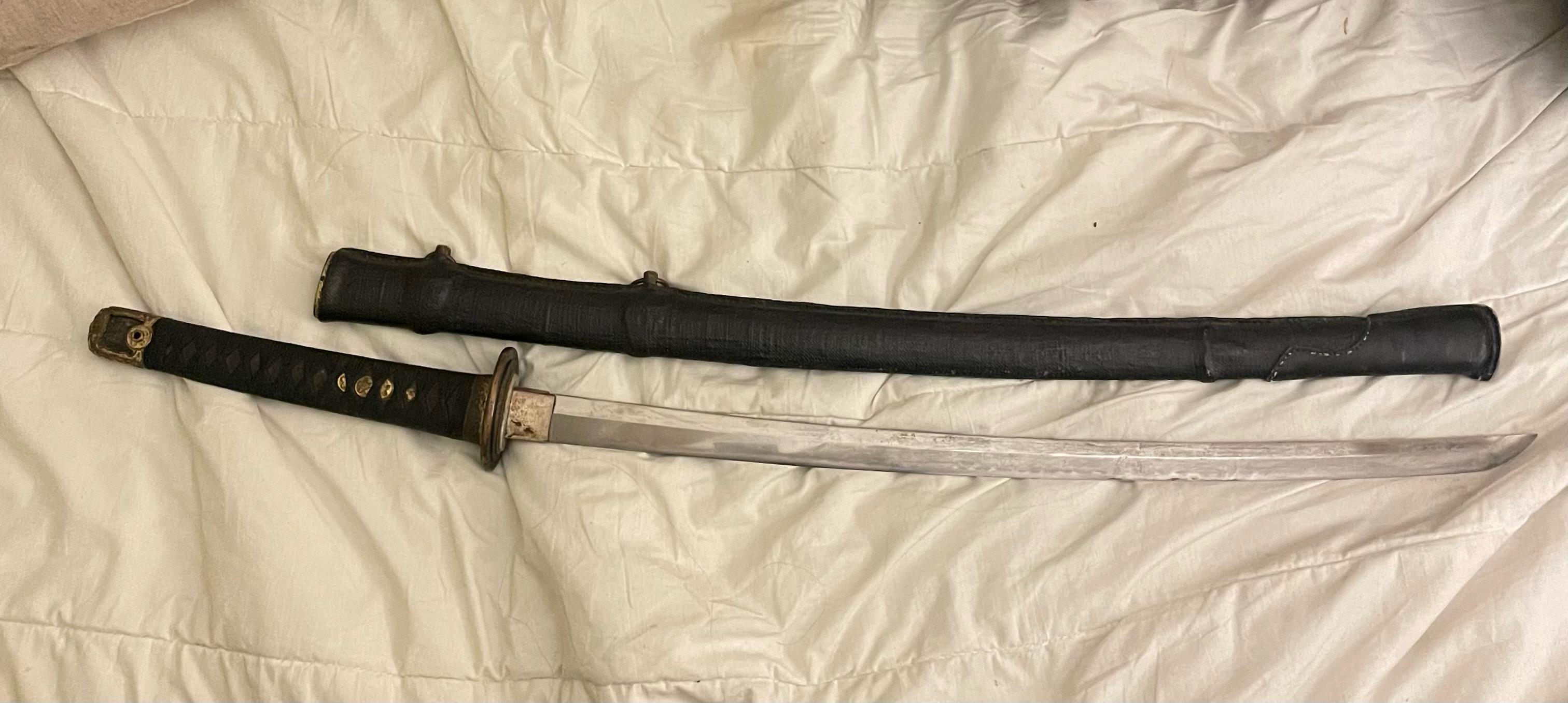 Help identifying ancient katana? Stepdad bought it from an antique shop