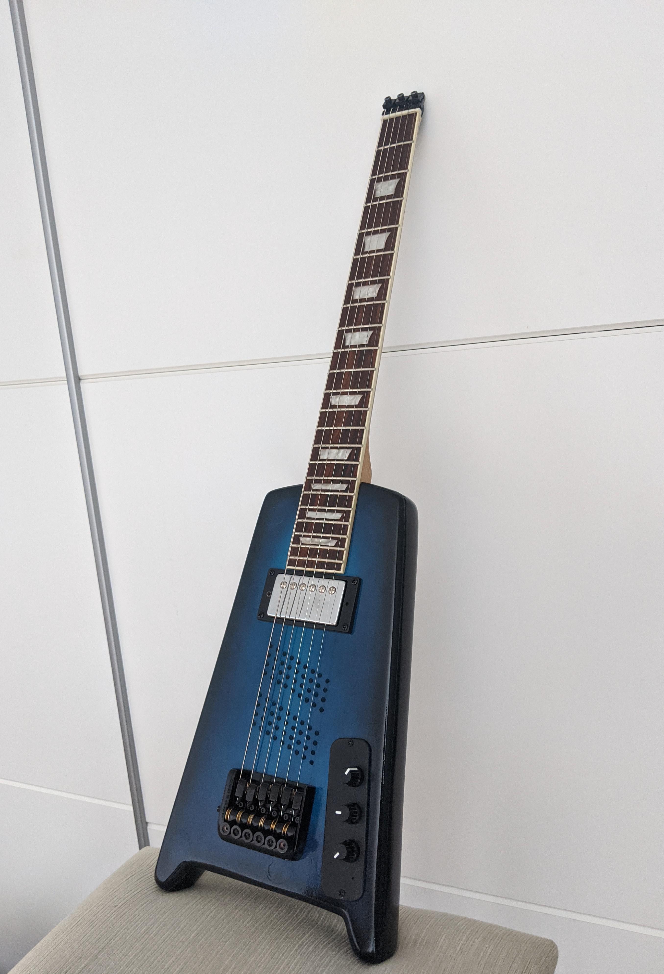 Headless guitar with built in amp. Done with only hand tools. r/Luthier