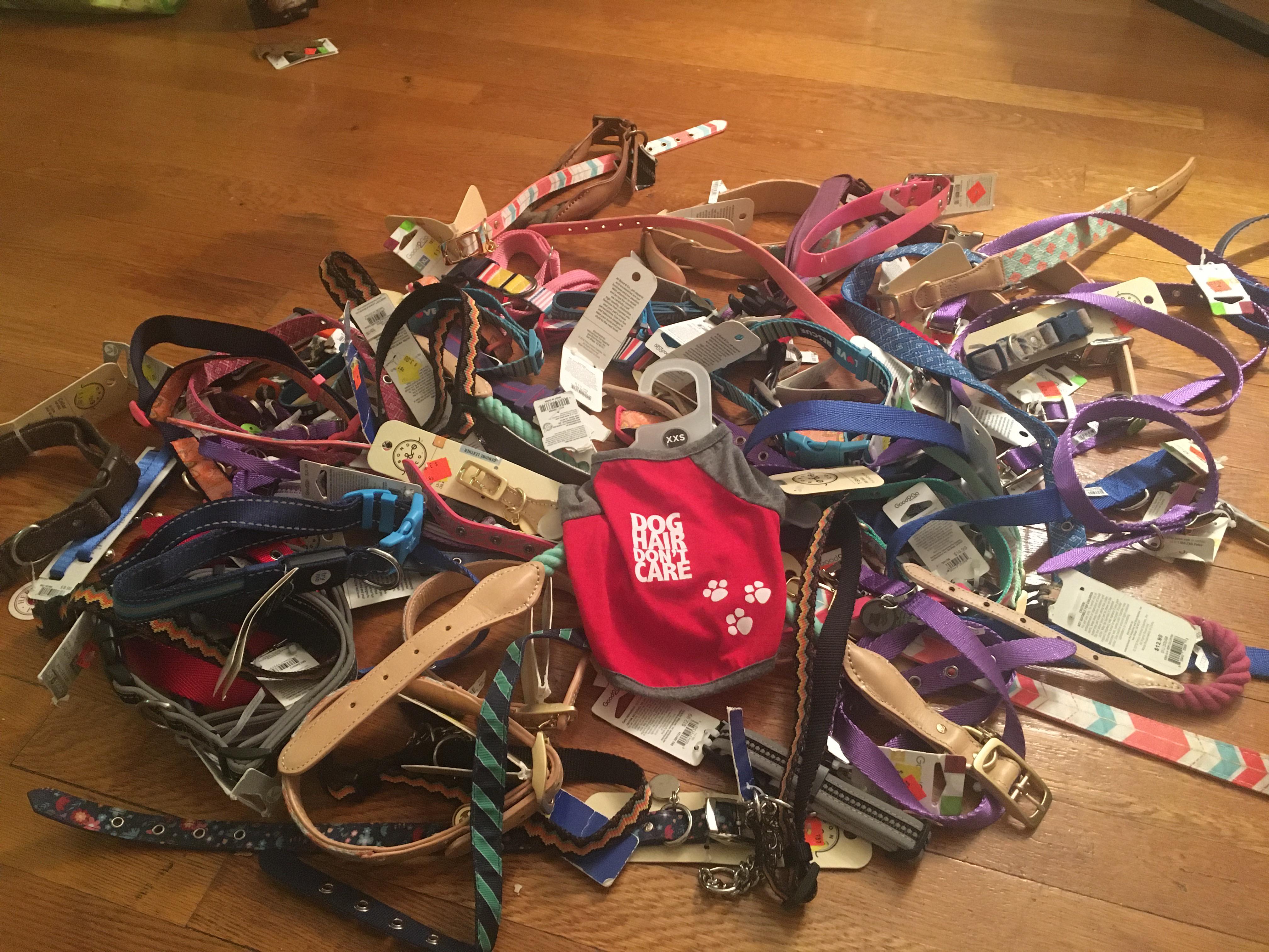 About a hundred dog collars with tags to be taken to our local shelter