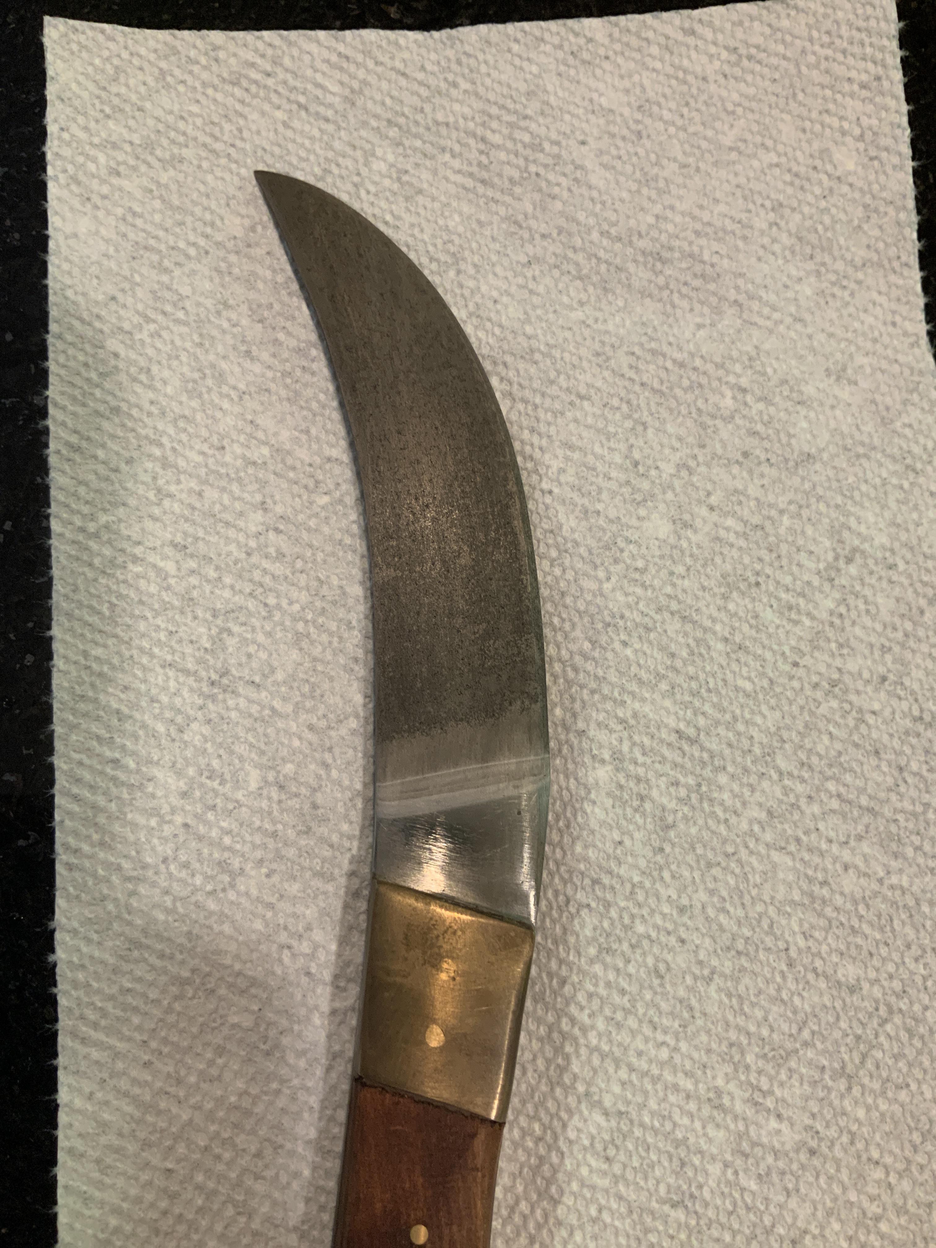 When I took my knife out of the container with an antirust solution, it looked like this and