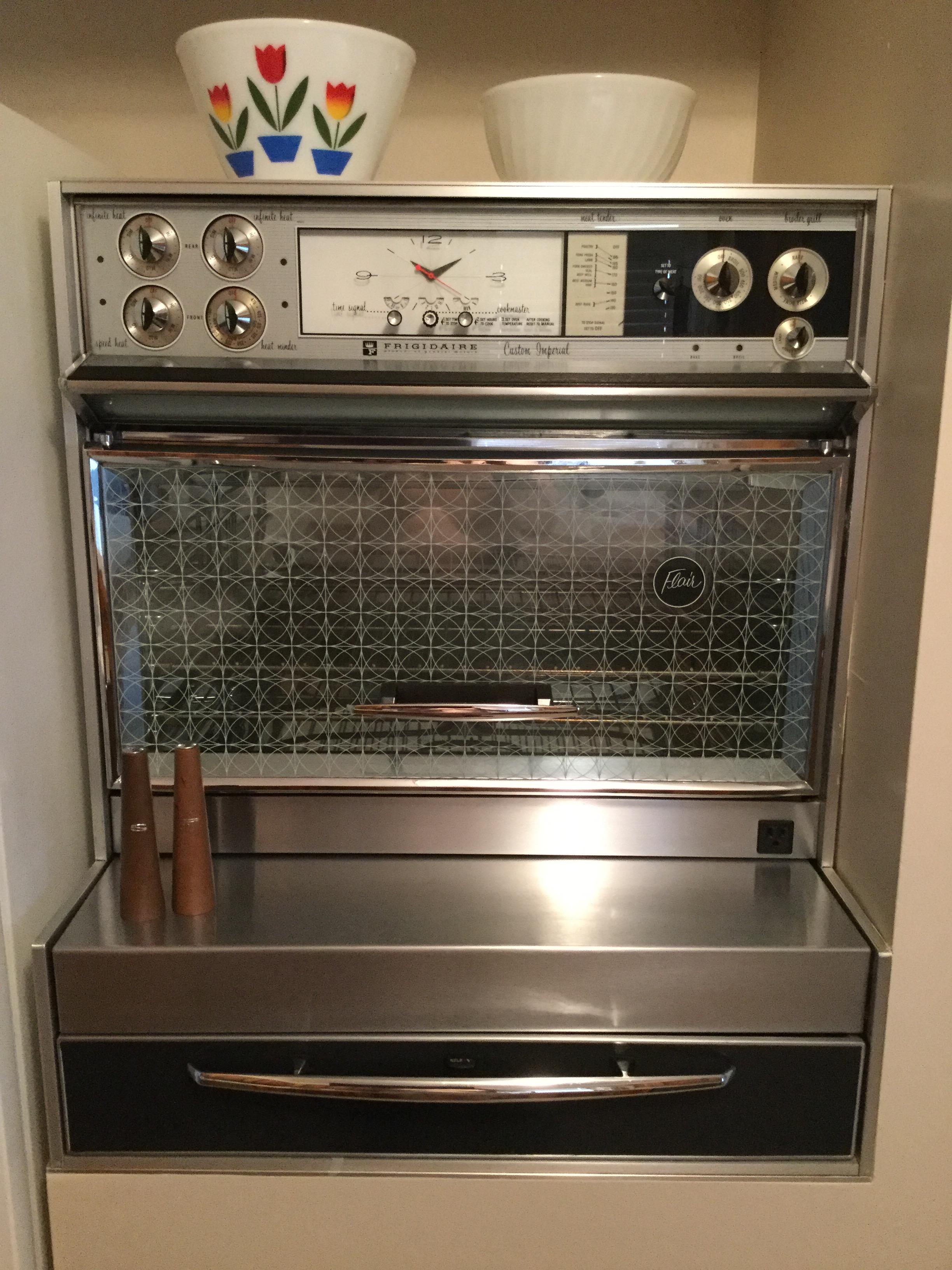Well MY salt & pepper shakers decorate a 1964 Frigidaire Flair cooktop
