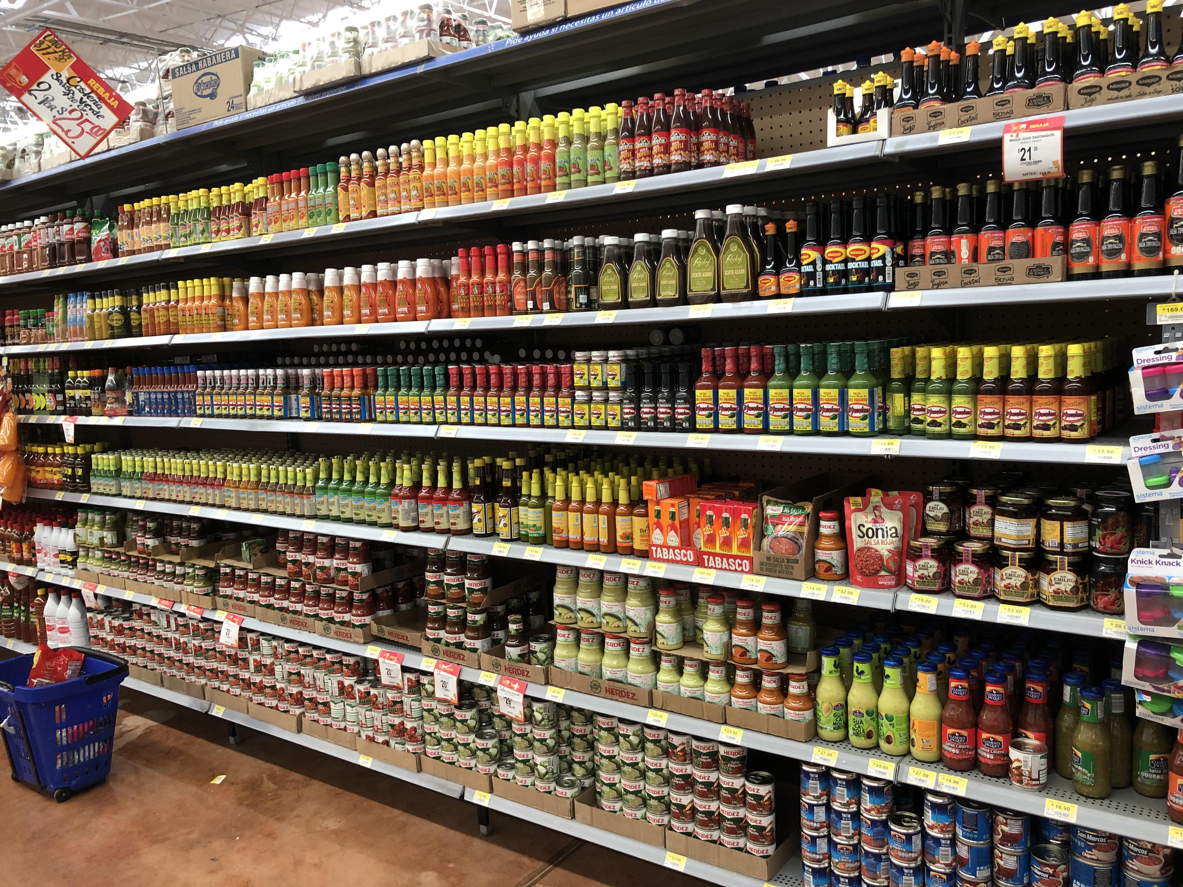 Hot sauce selection at a Merida, Yucatan Walmart. Huge selection of