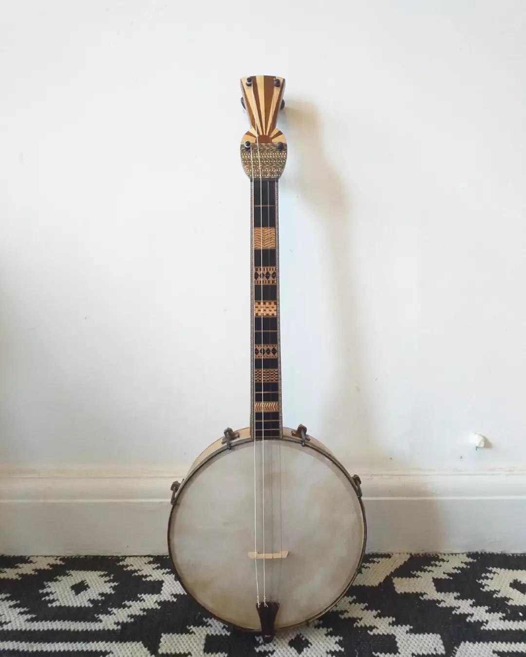 just finished this fretless baritone banjo uke. r/banjo