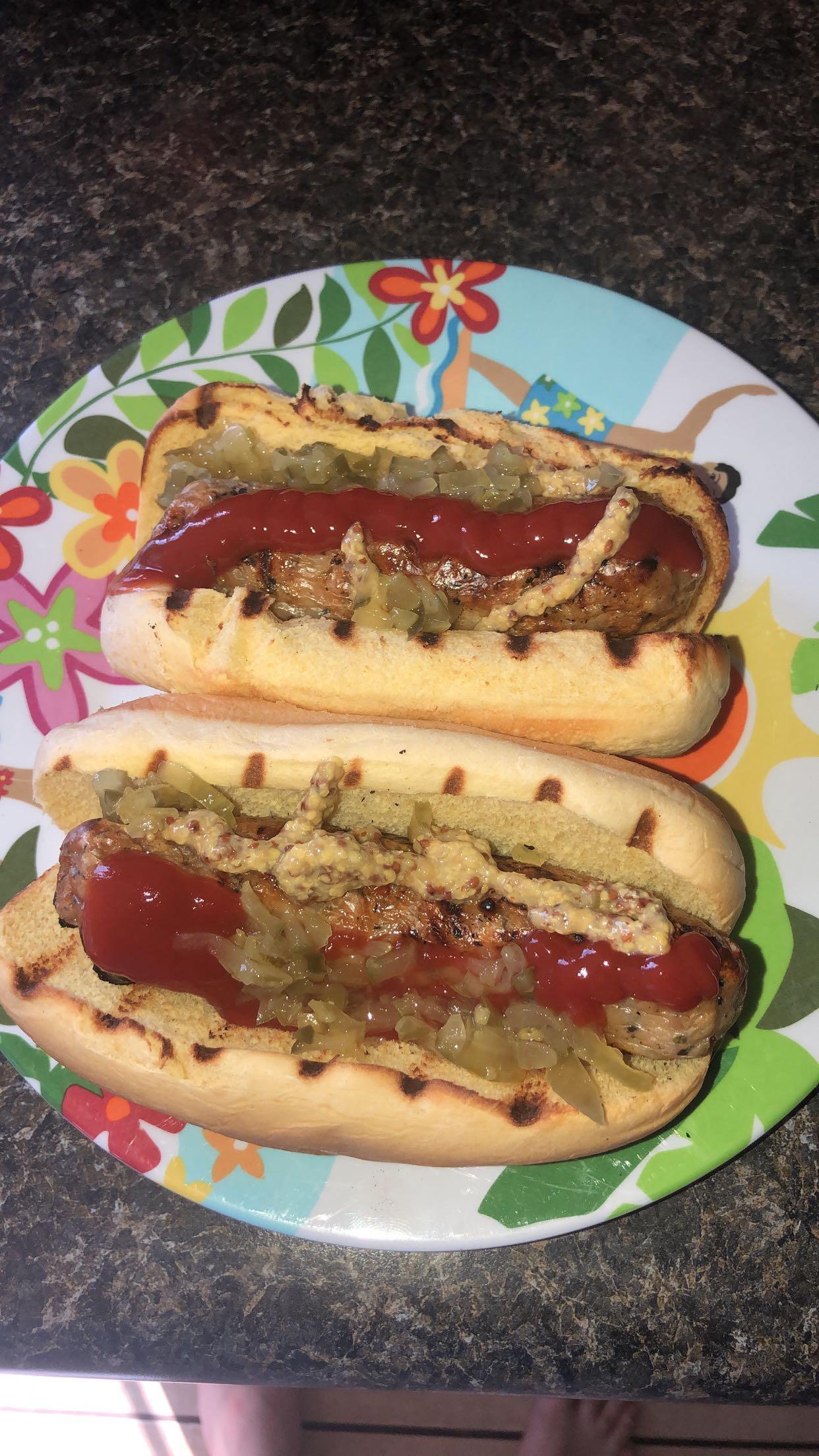 Spicy Cajun chicken franks with grey poupon, ketchup, and dill relish. Grilled the franks and