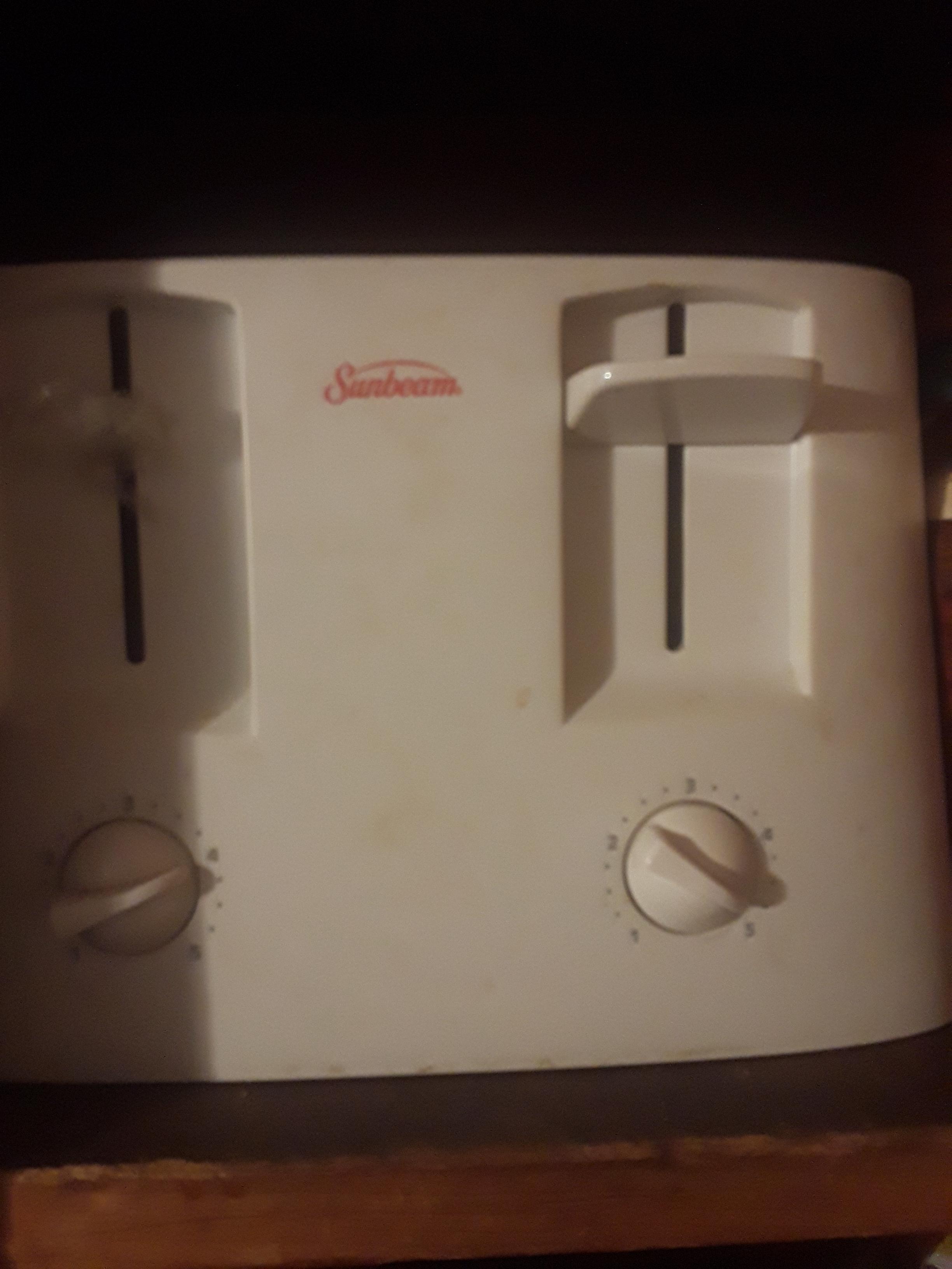 Here's my good old Sunbeam toaster. Has seen better days but it makes